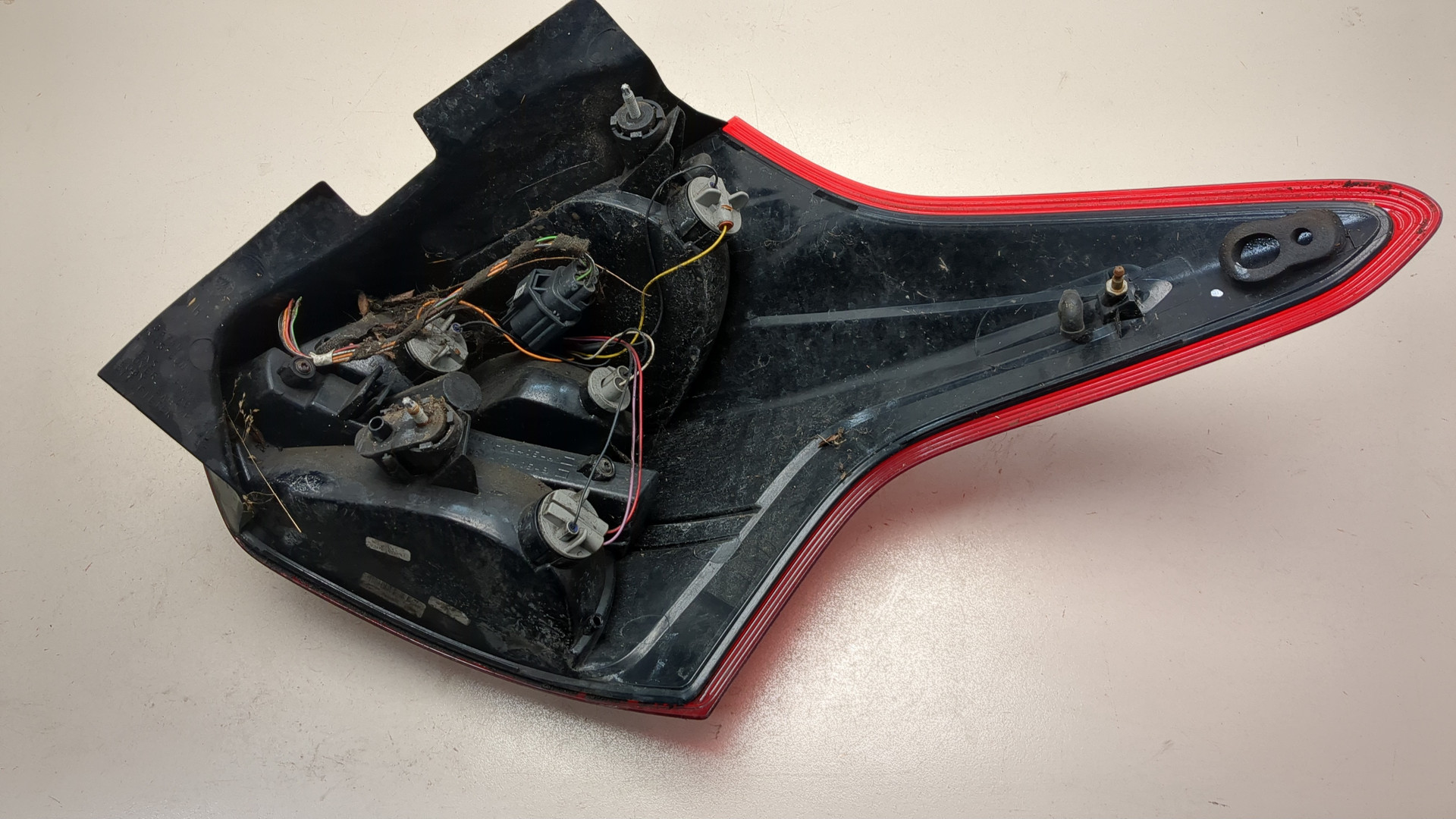 Фонарь задний левый