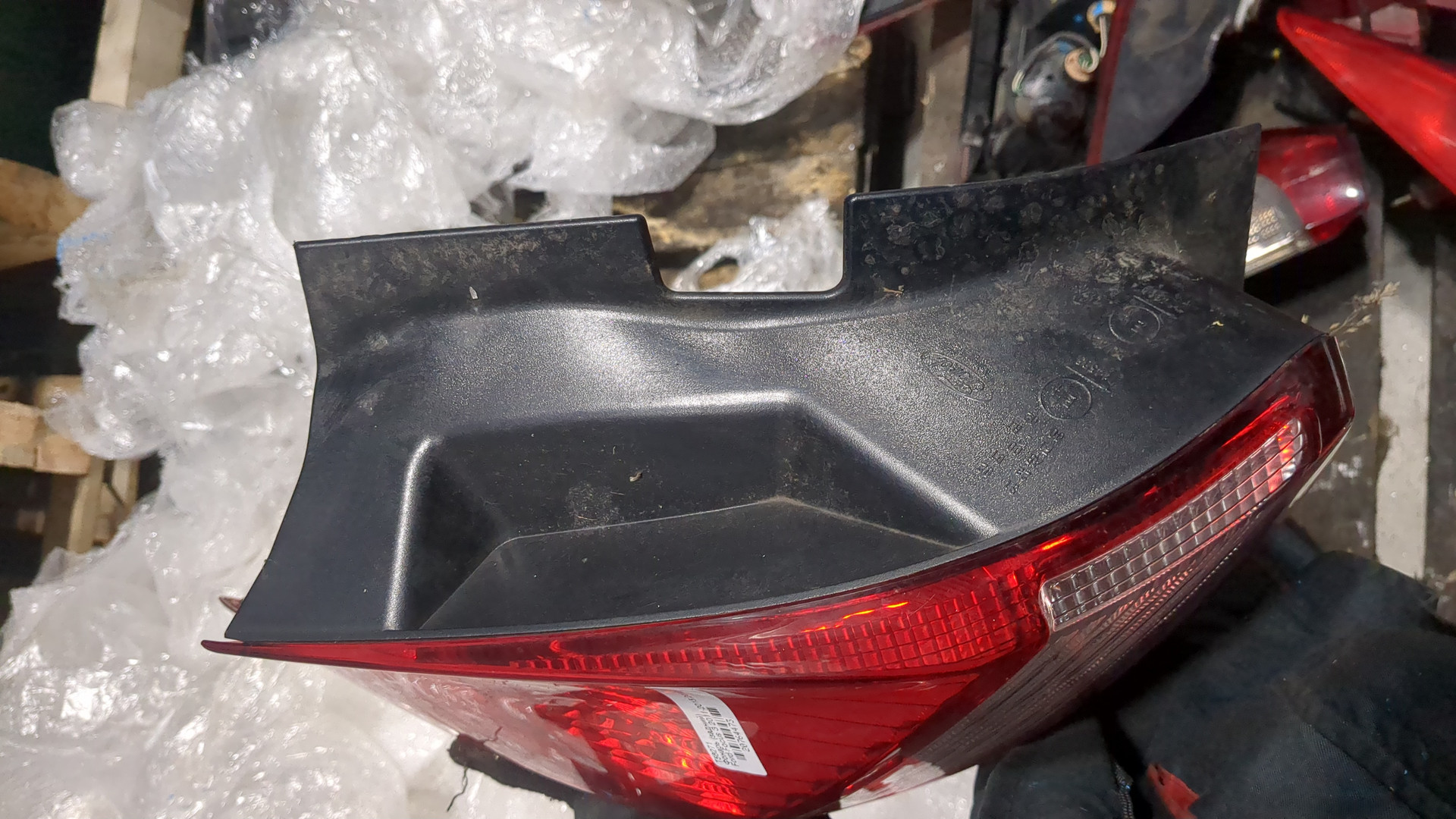 Фонарь задний левый