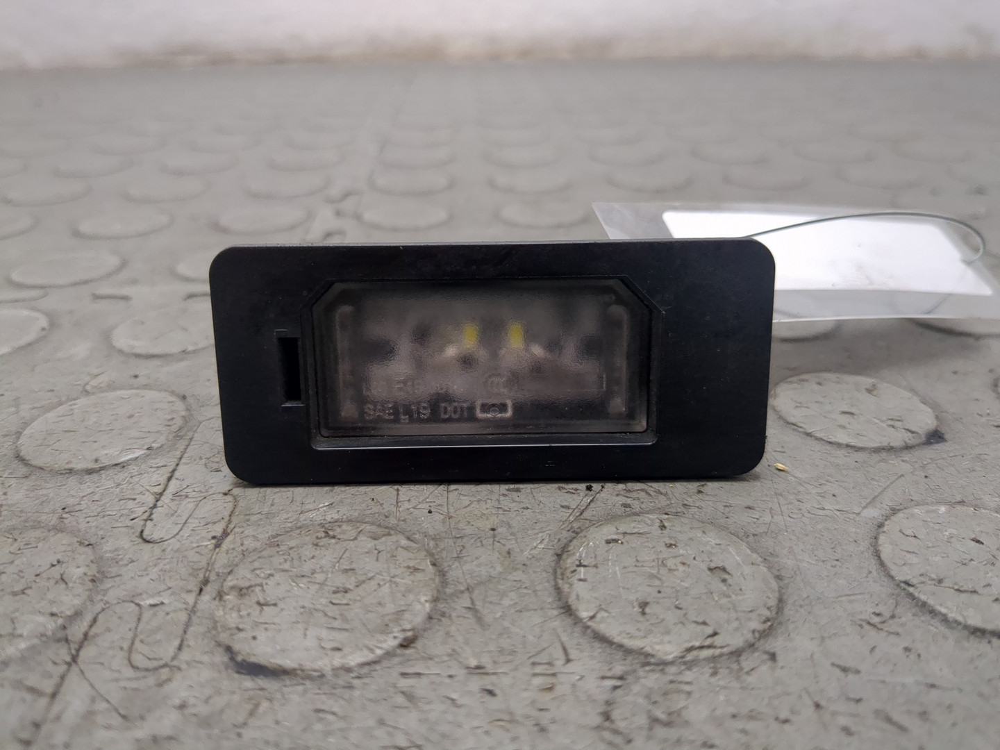 Фонарь подсветки номера