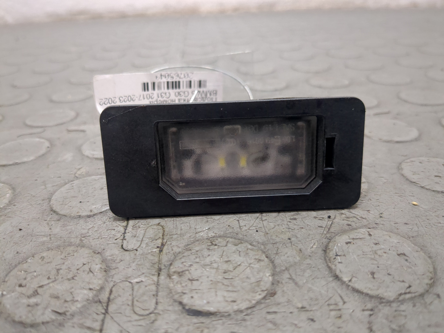 Фонарь подсветки номера