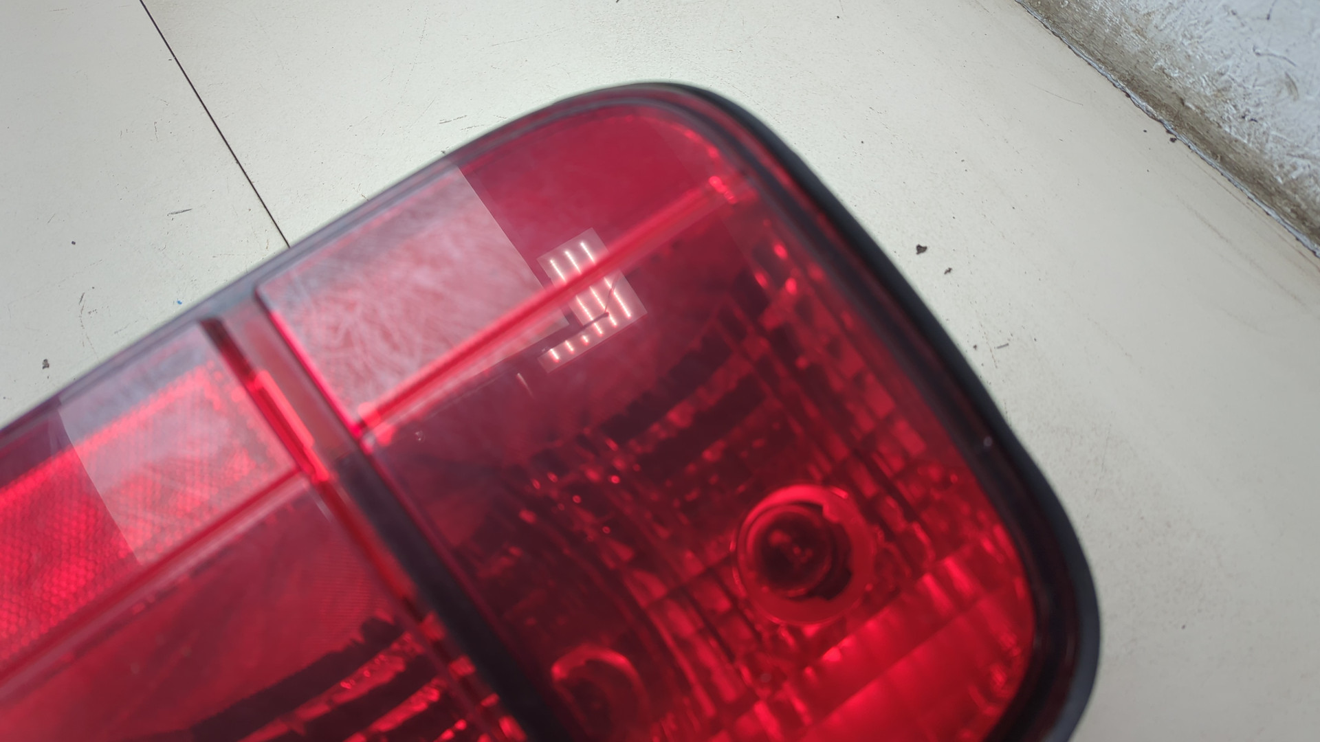 Фонарь задний левый