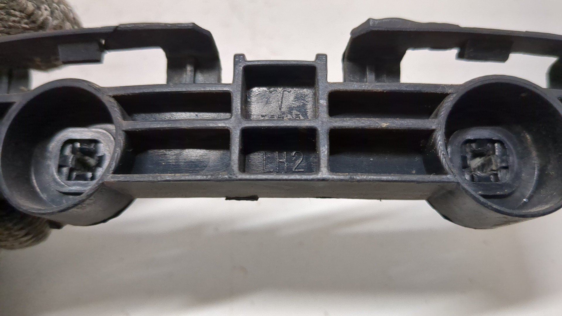 Кронштейн заднего бампера левый