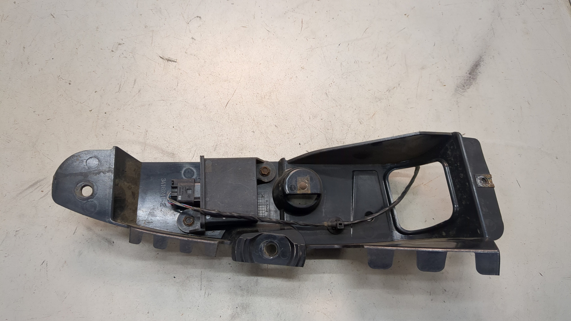 Кронштейн заднего бампера левый