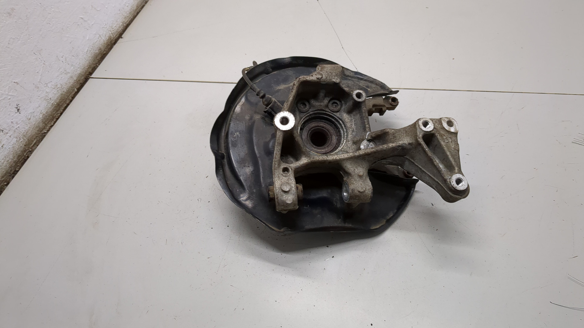 Кулак поворотный задний левый