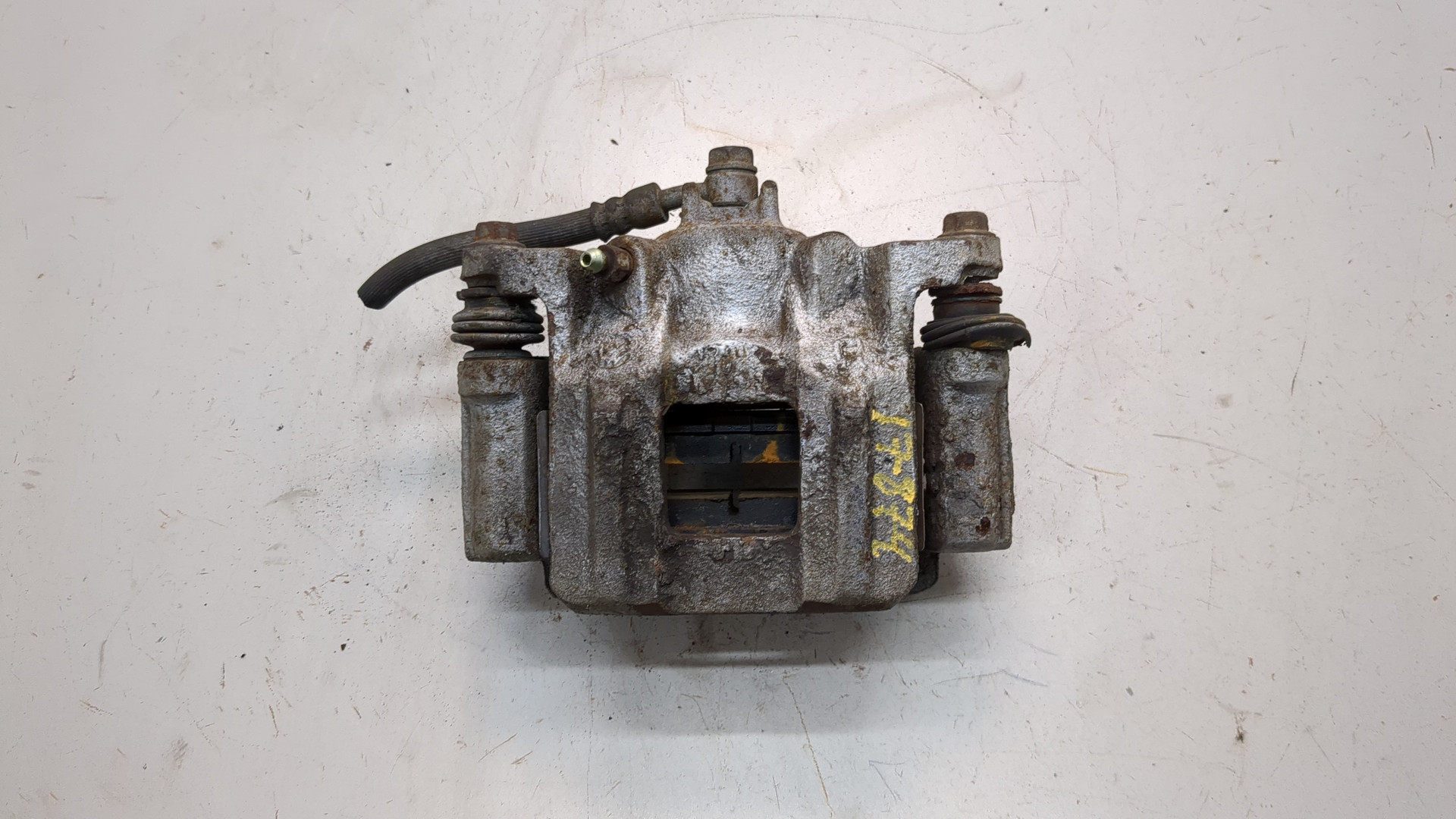 Суппорт задний левый