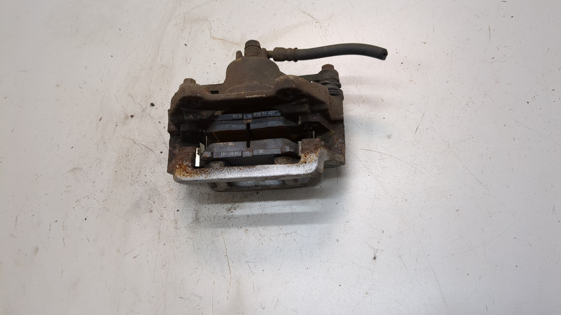 Суппорт задний левый