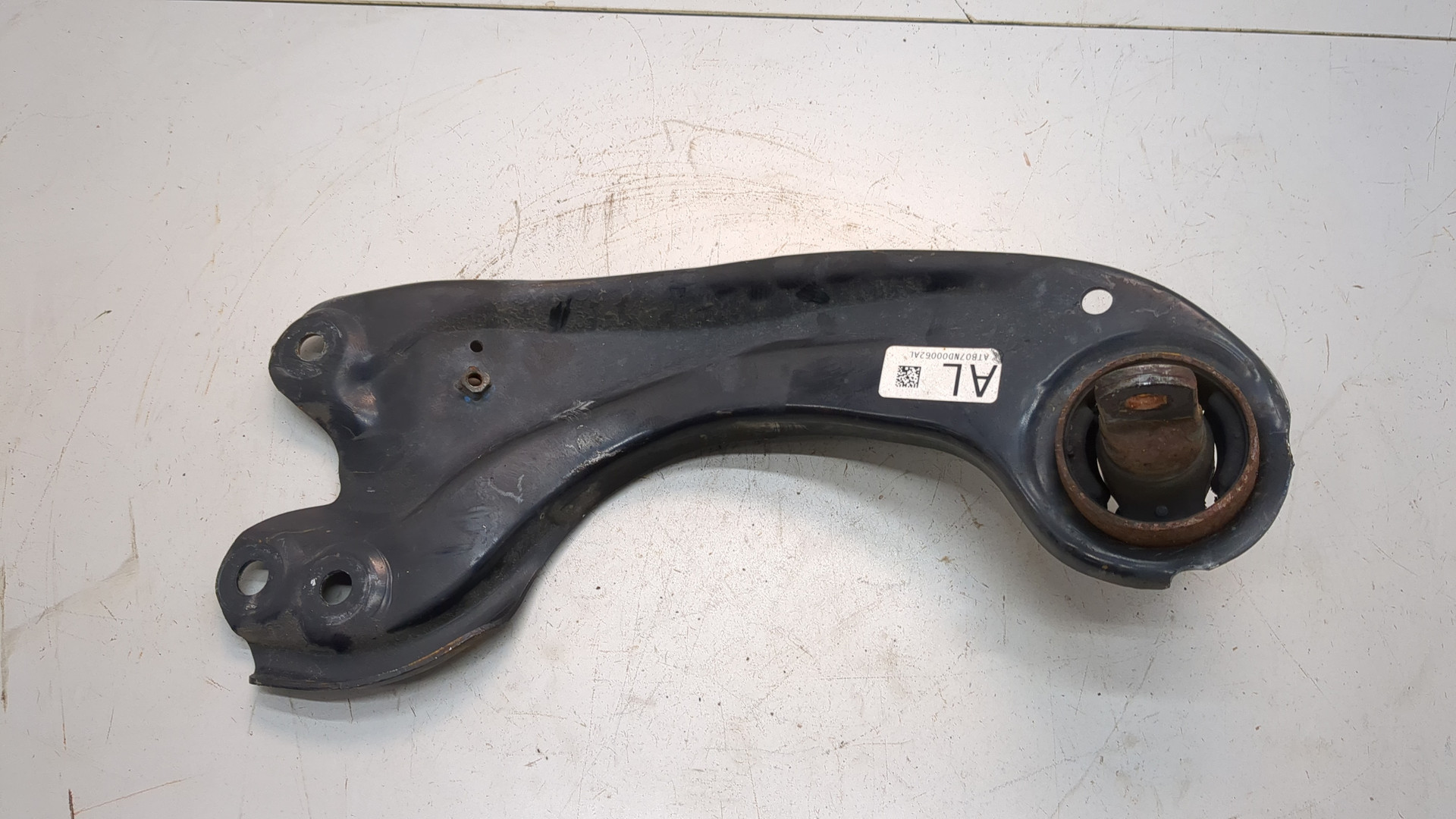 Рычаг задний левый