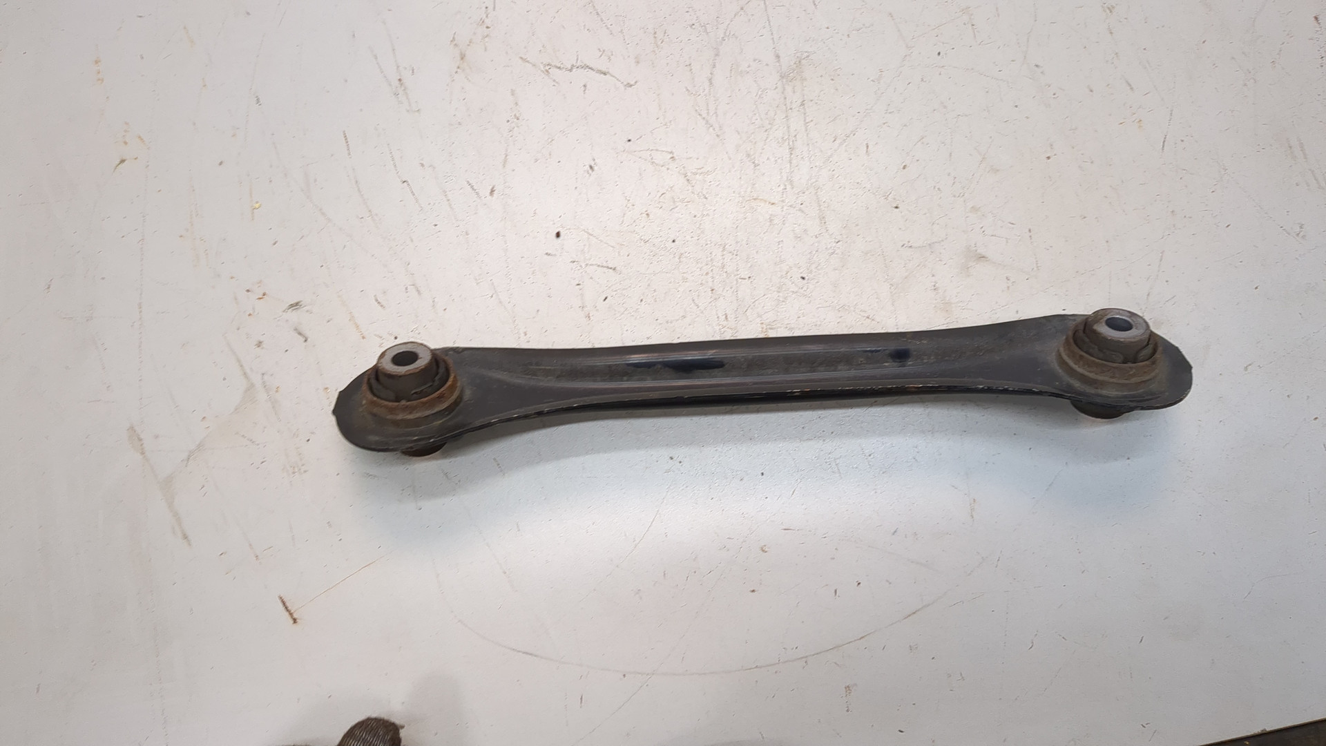 Рычаг задний