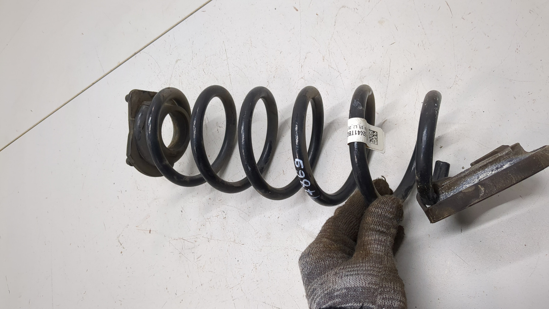 Пружина задняя