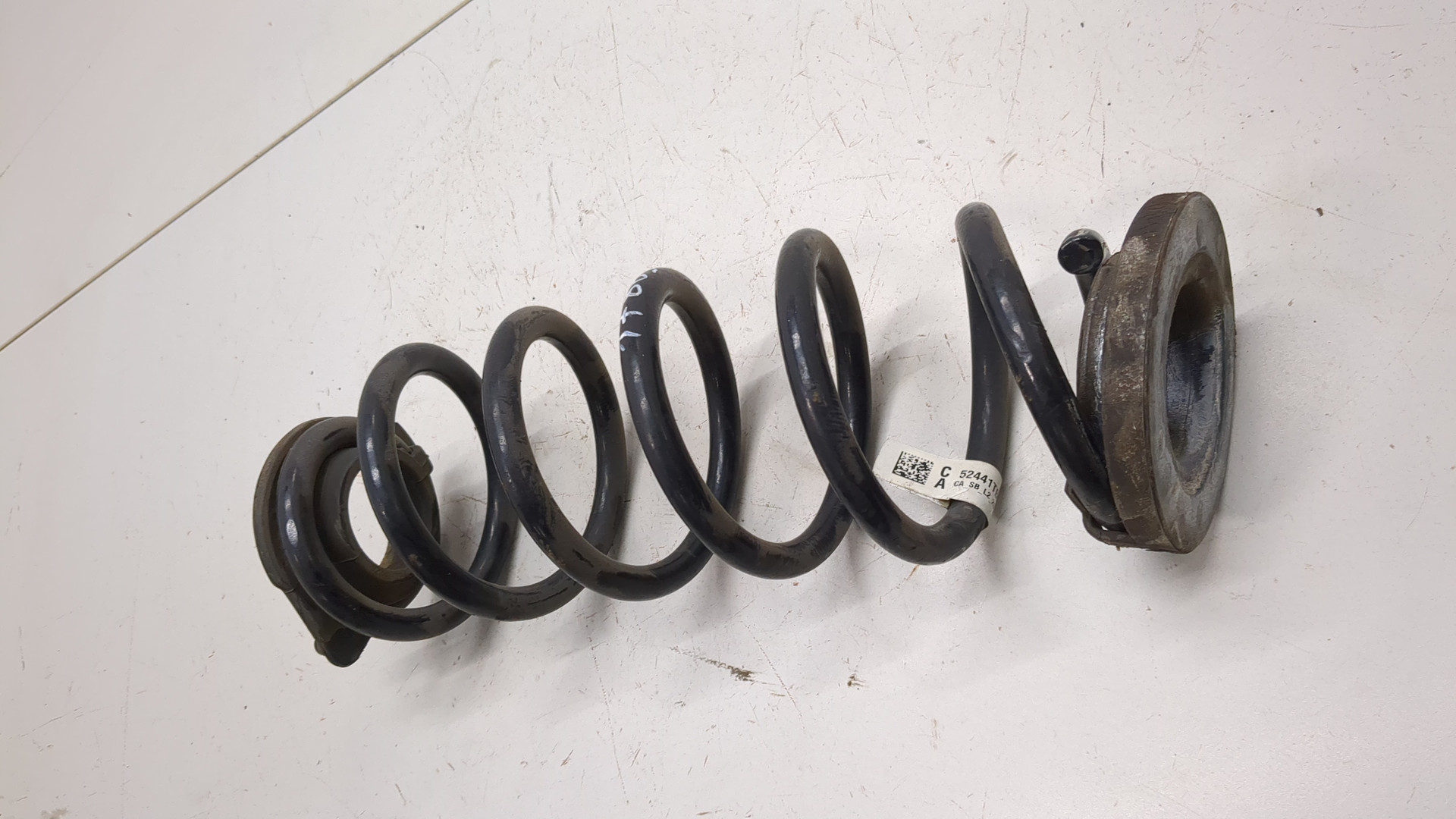 Пружина задняя