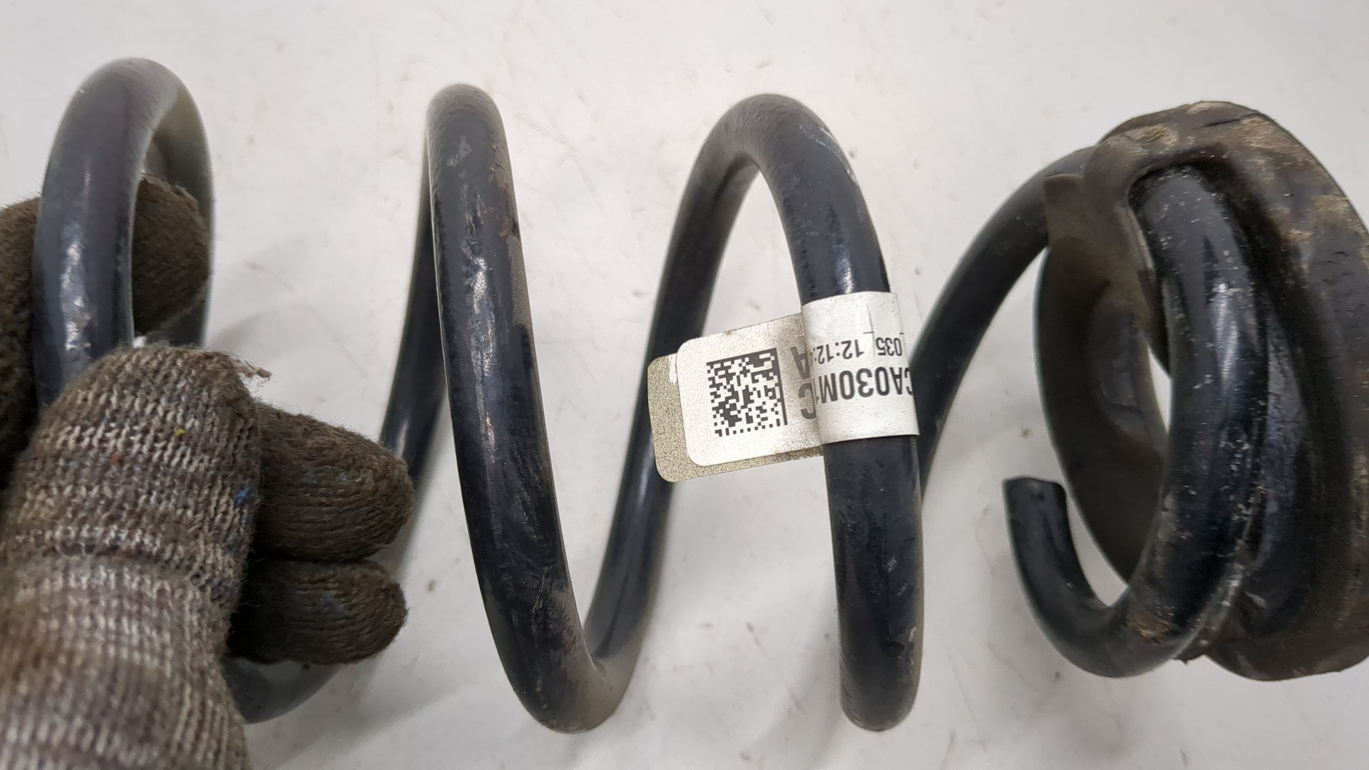 Пружина задняя