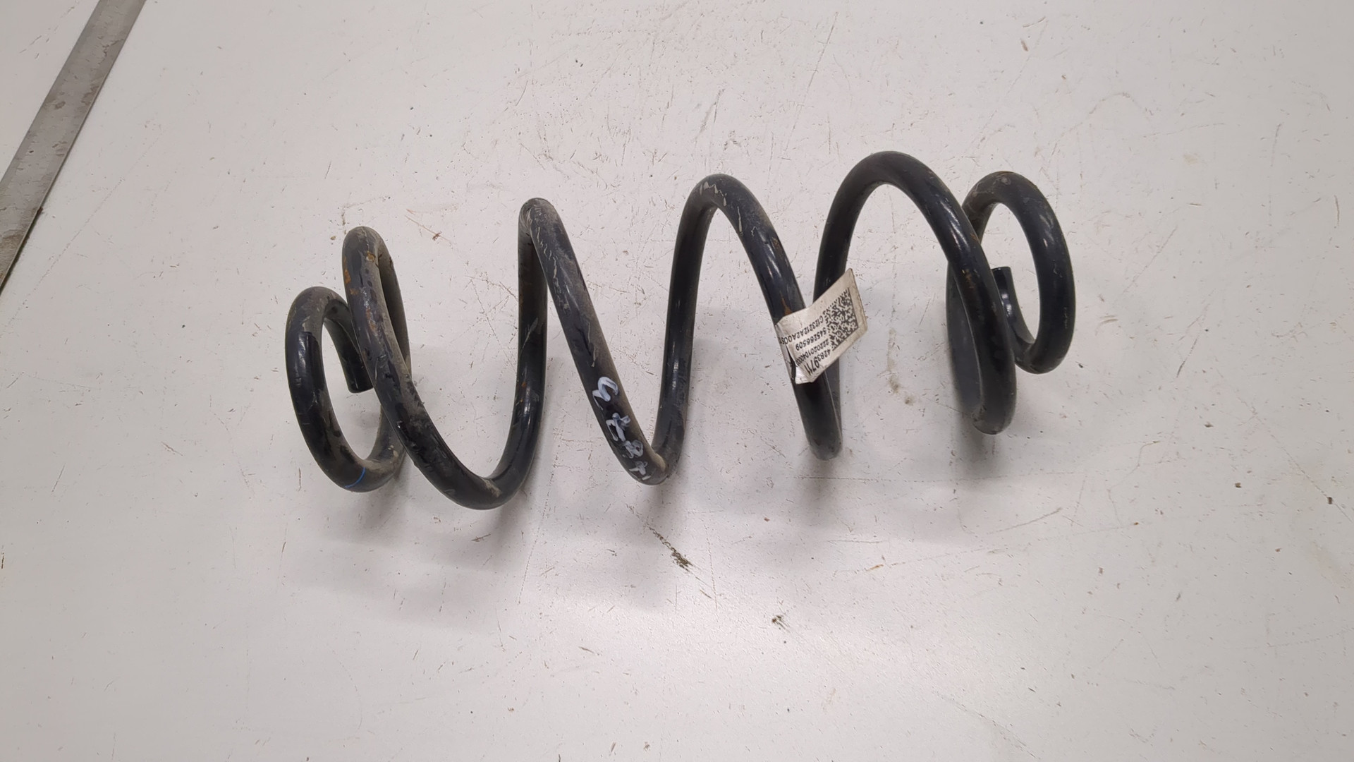 Пружина задняя