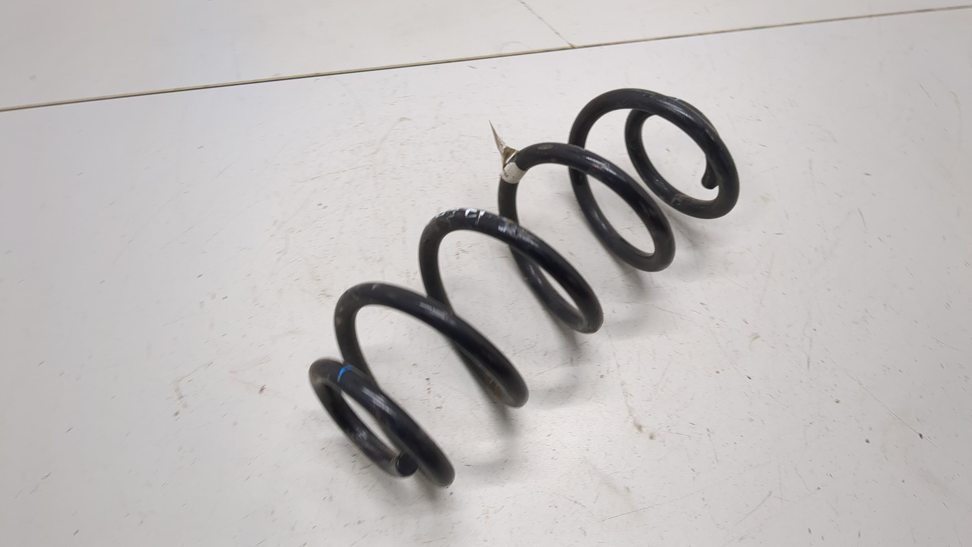 Пружина задняя