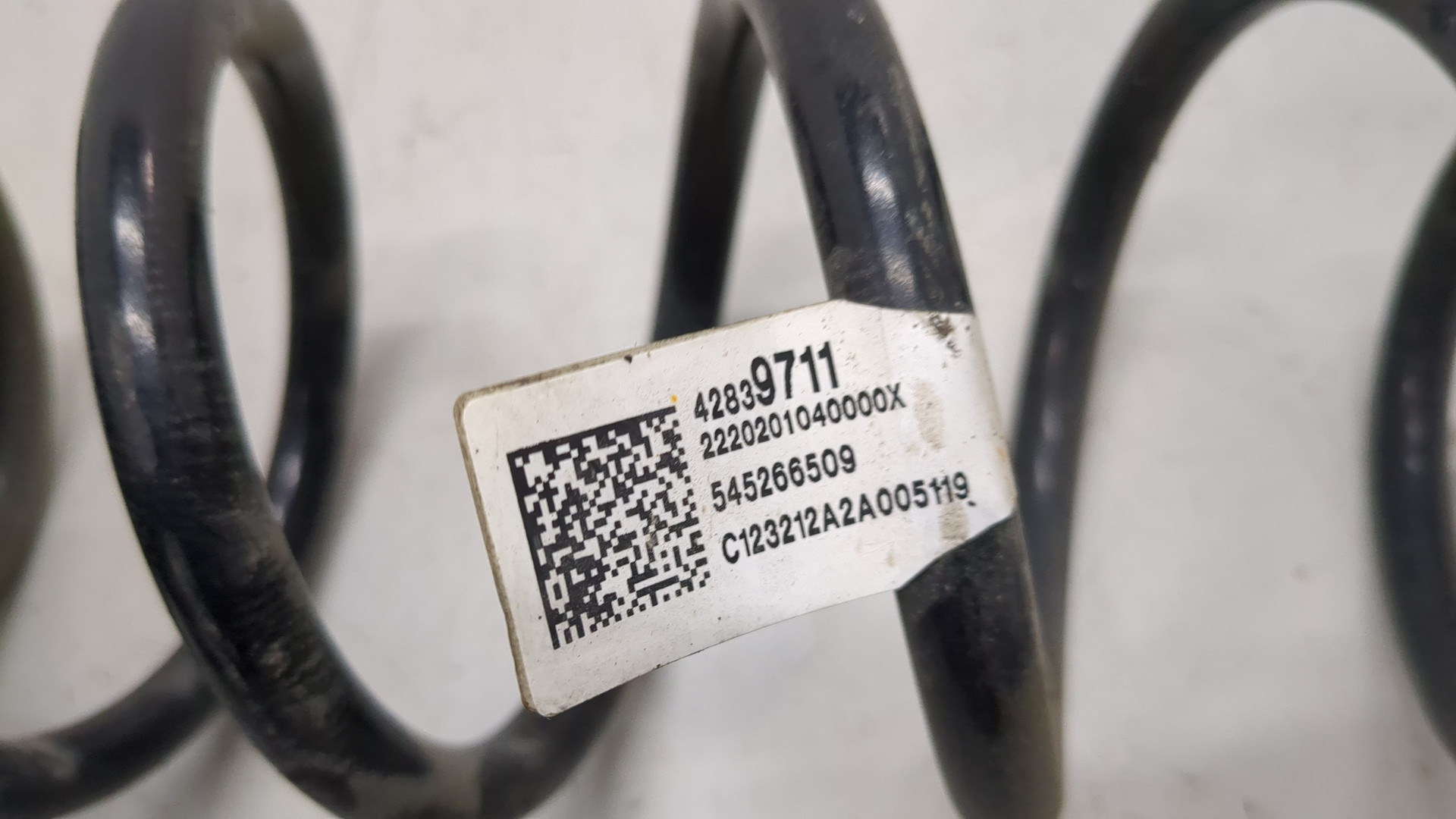 Пружина задняя