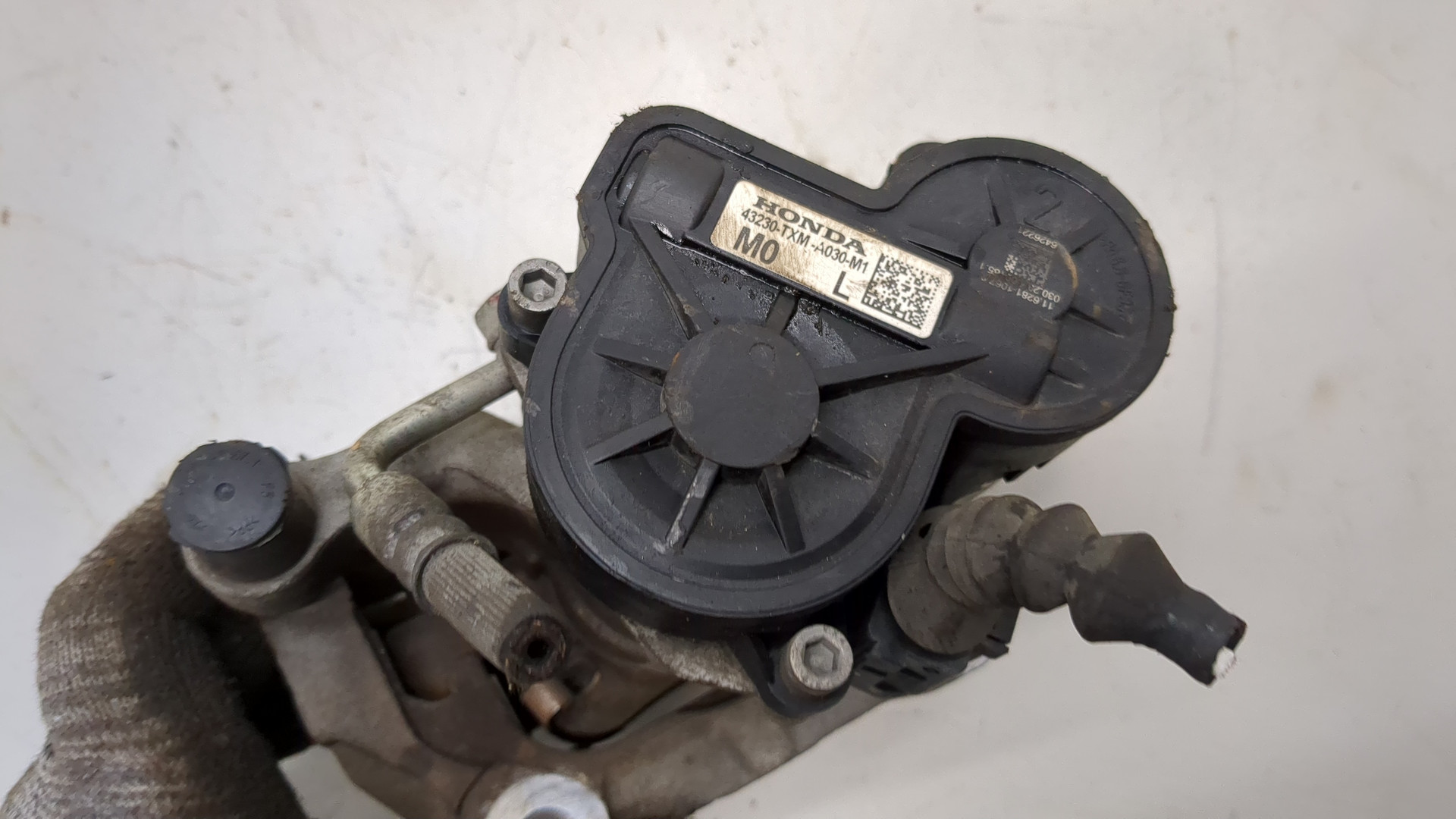 Суппорт задний левый