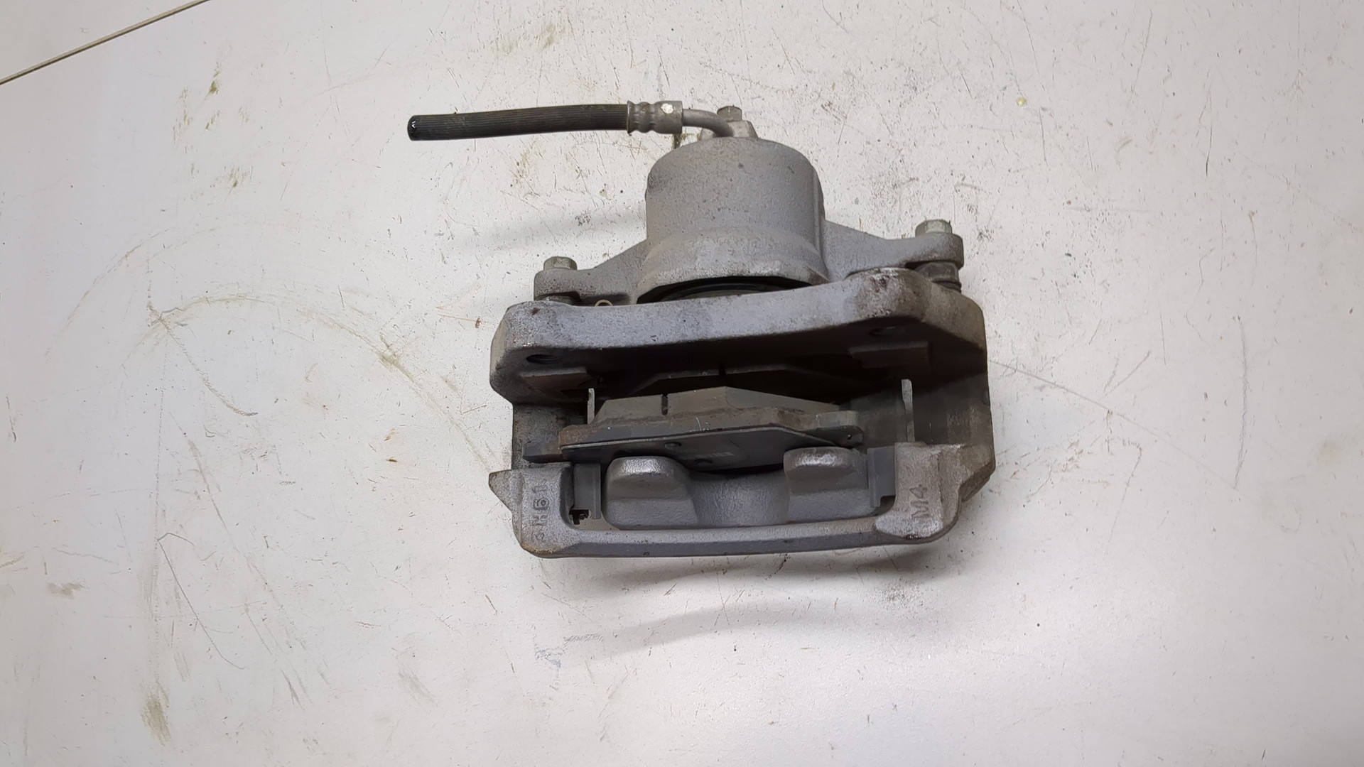 Суппорт передний левый