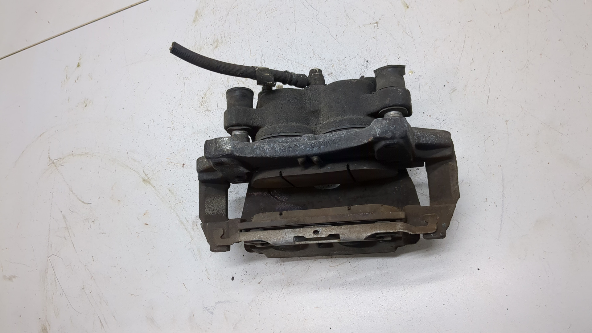 Суппорт передний левый