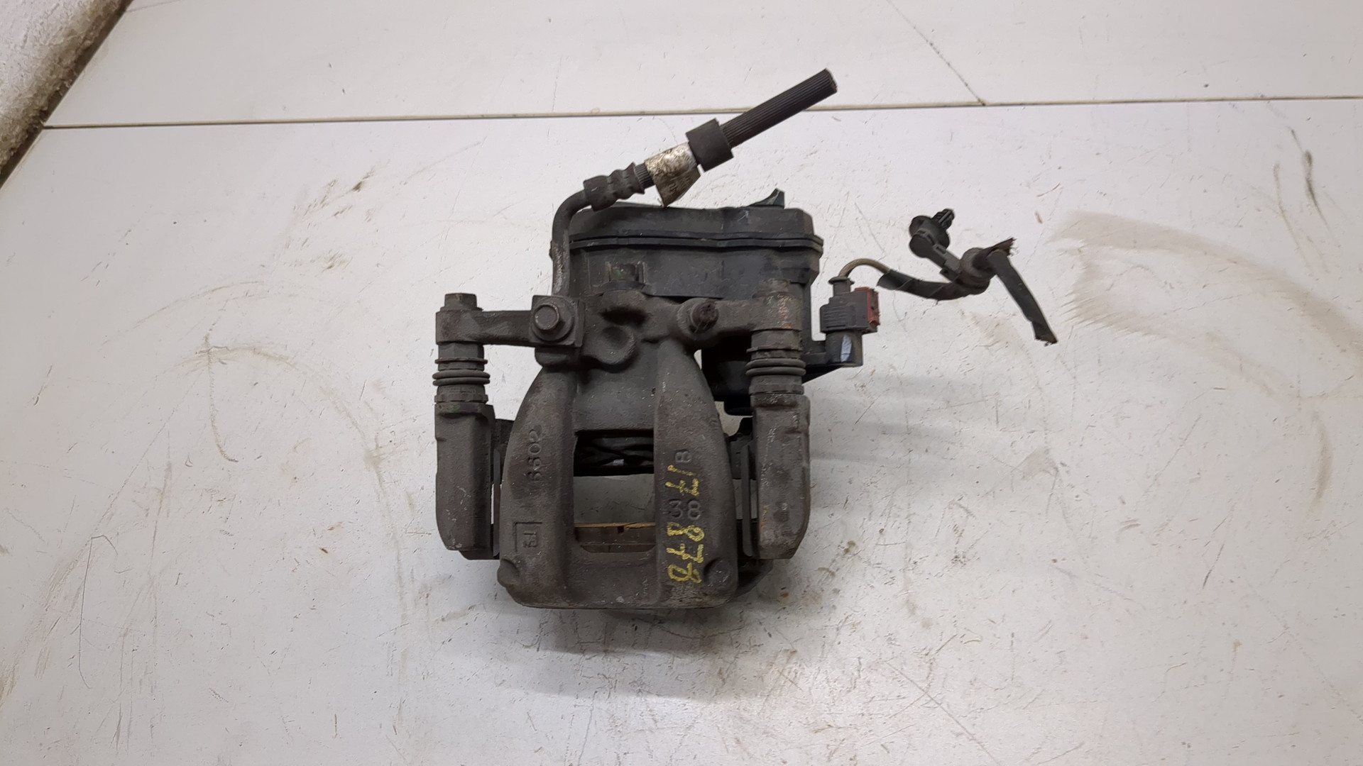 Суппорт задний левый