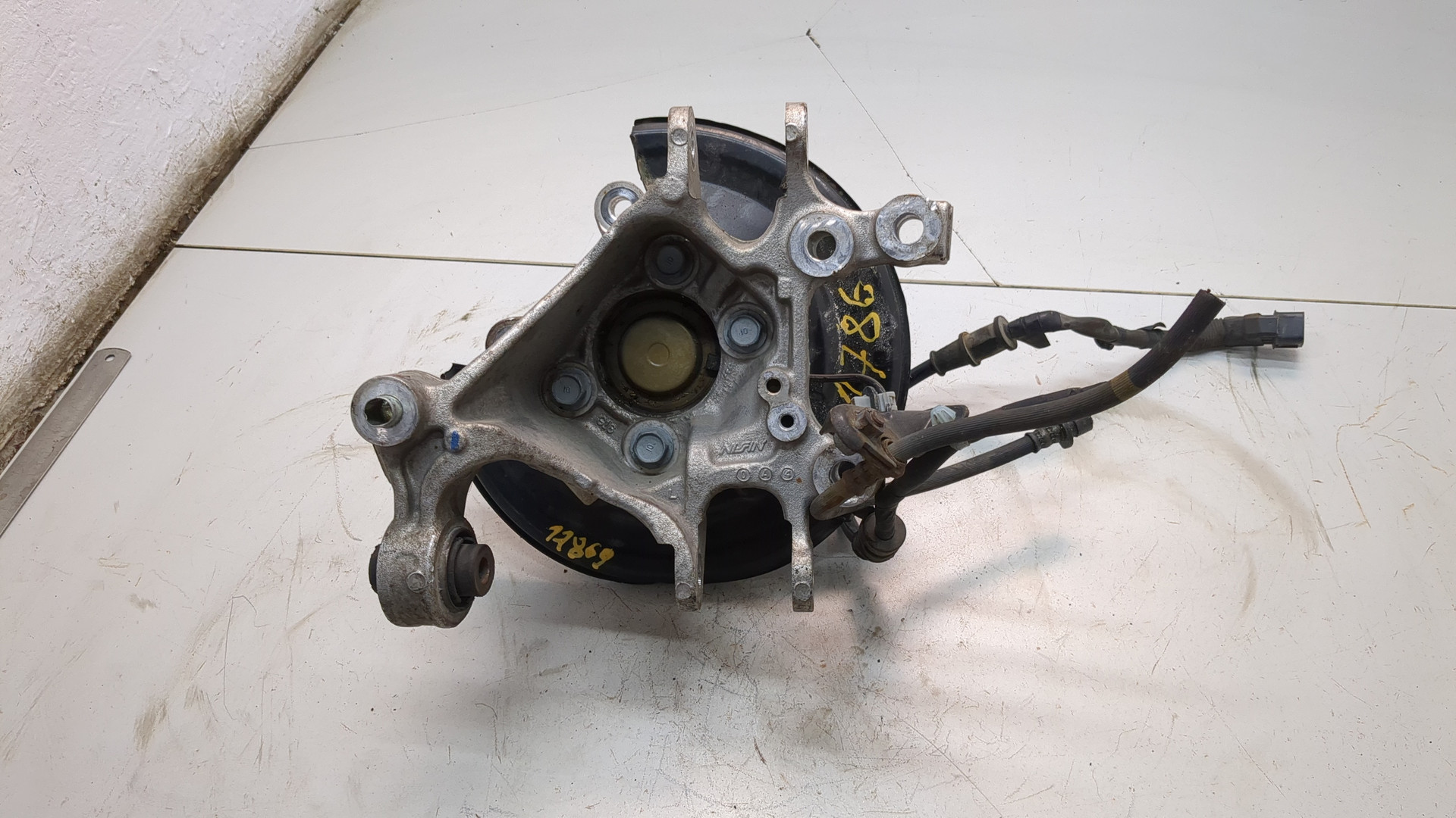 Кулак поворотный задний левый