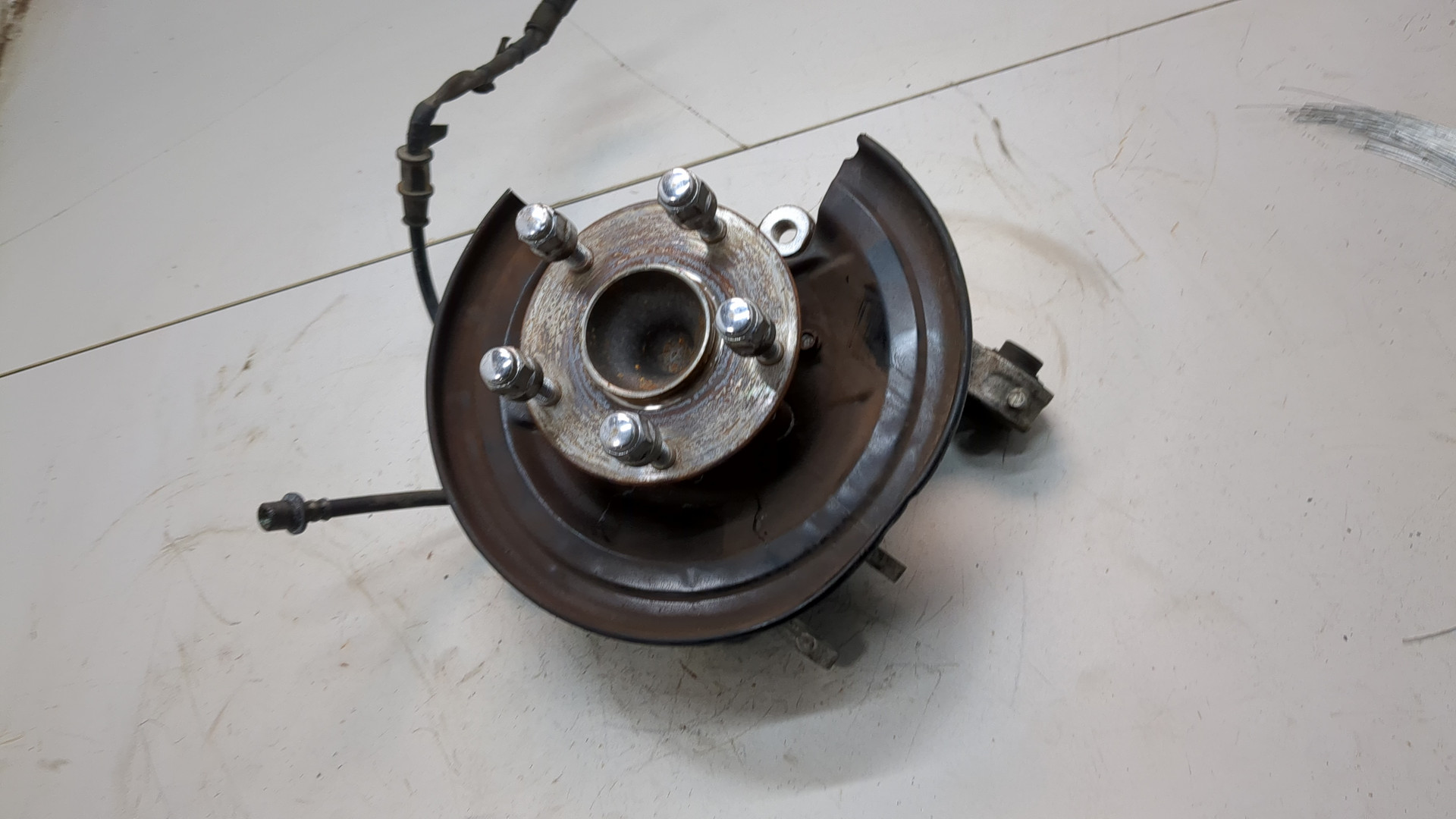 Кулак поворотный задний левый