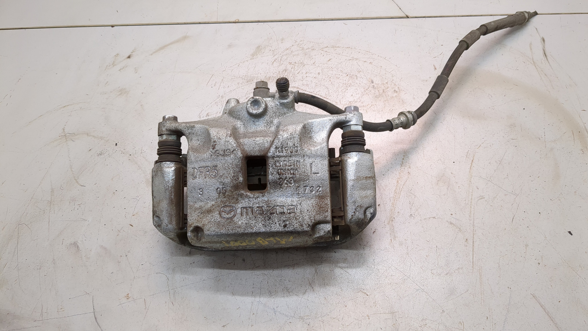 Суппорт передний левый