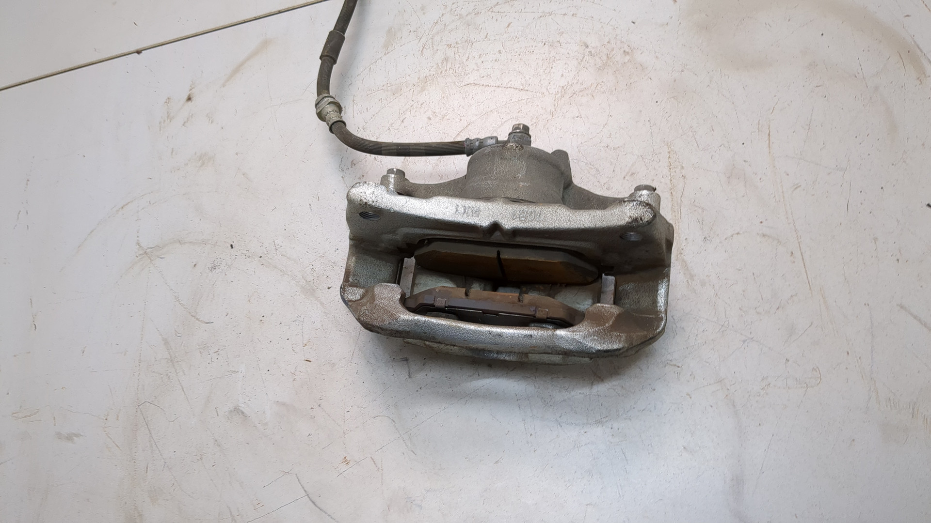 Суппорт передний левый