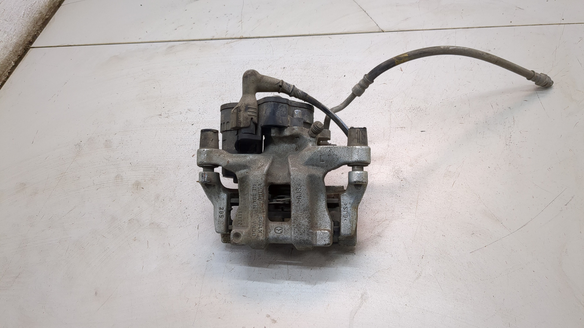 Суппорт задний левый