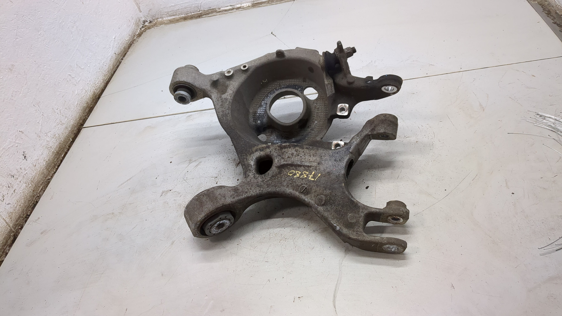 Рычаг задний левый