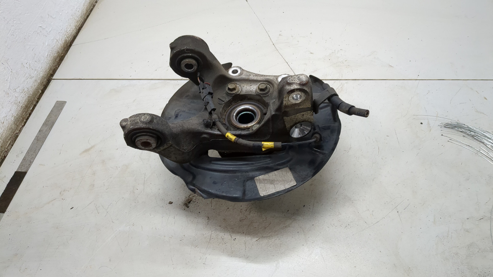 Кулак поворотный задний левый