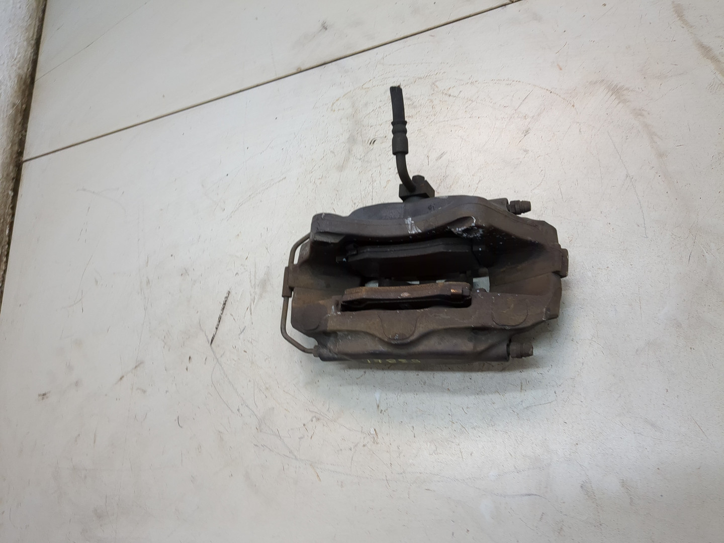 Суппорт задний левый