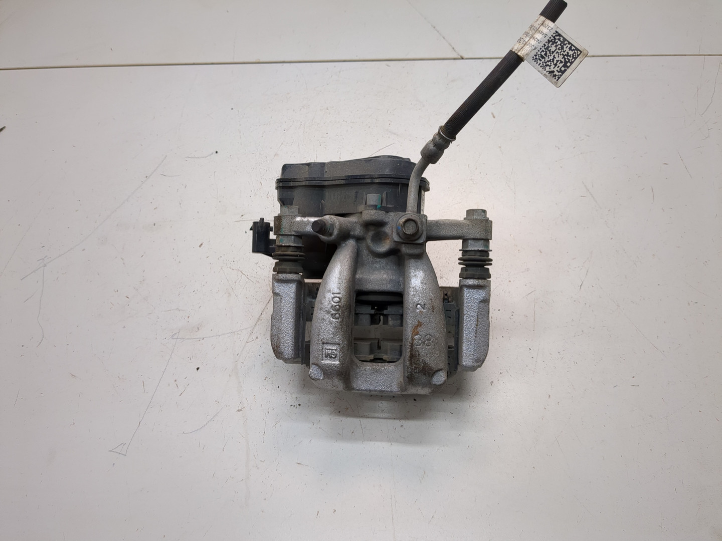 Суппорт задний левый