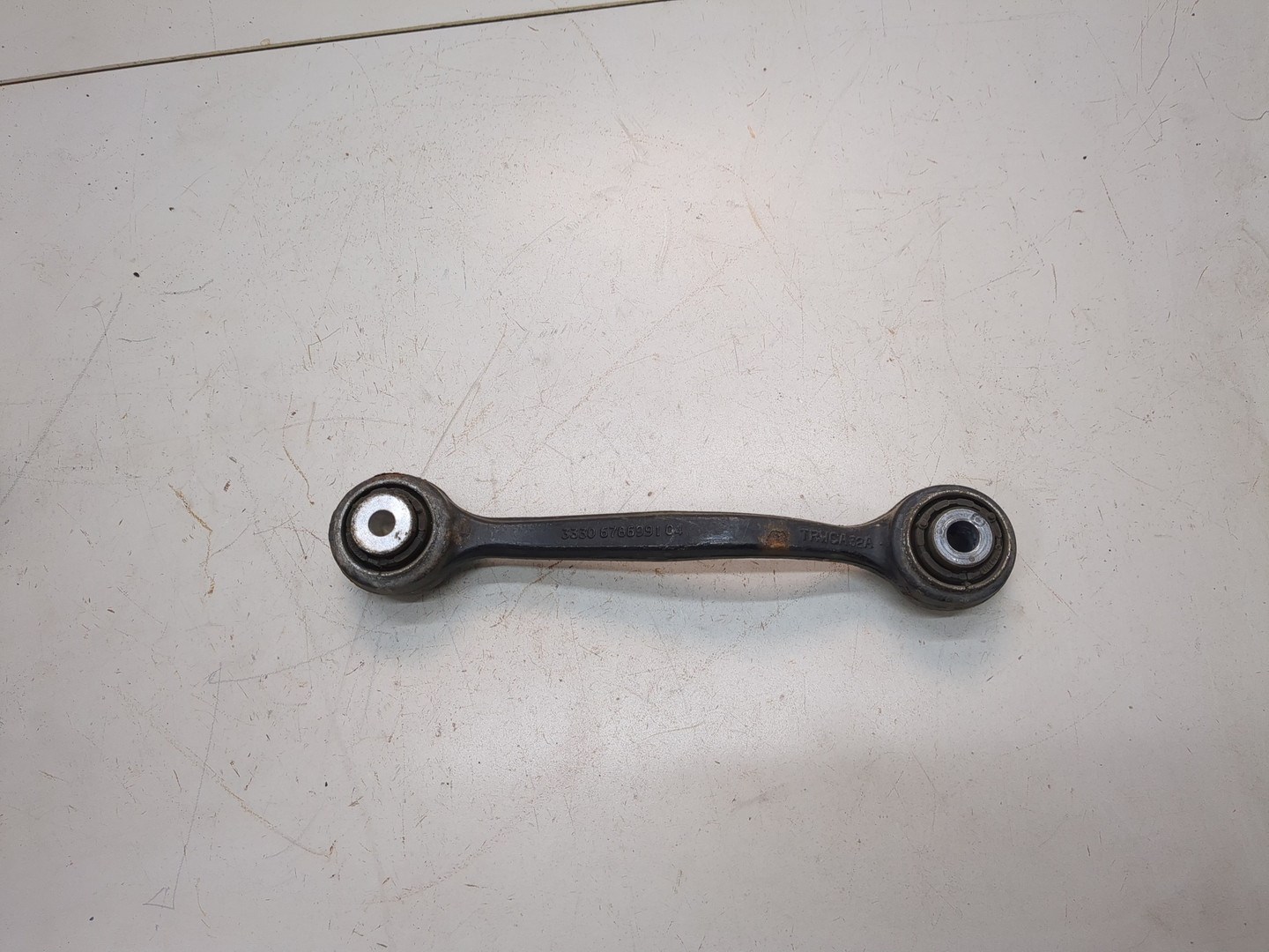 Рычаг задний