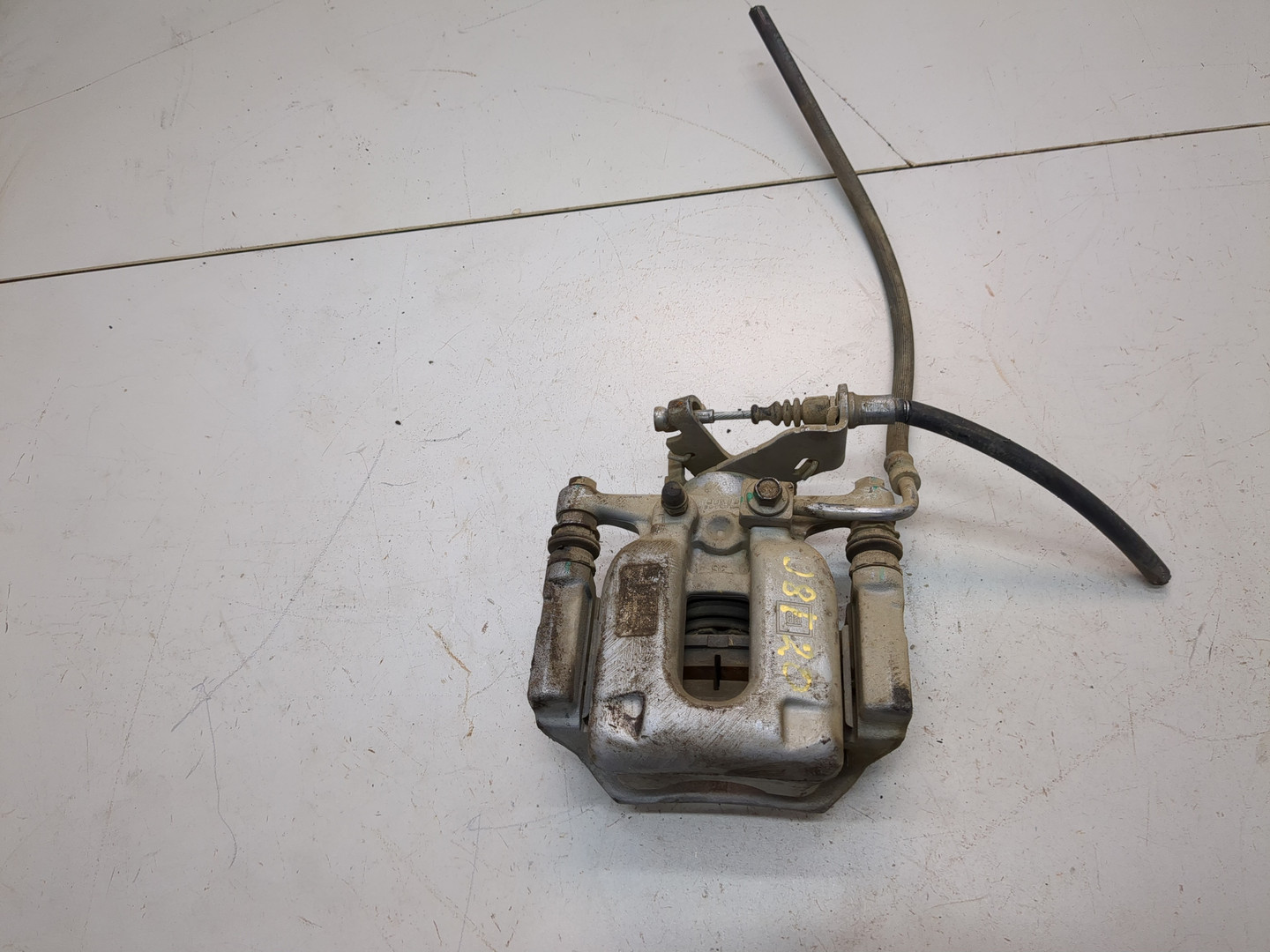 Суппорт задний левый