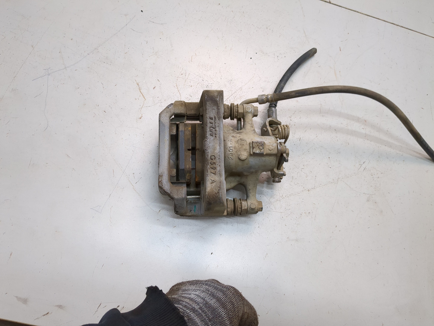 Суппорт задний левый