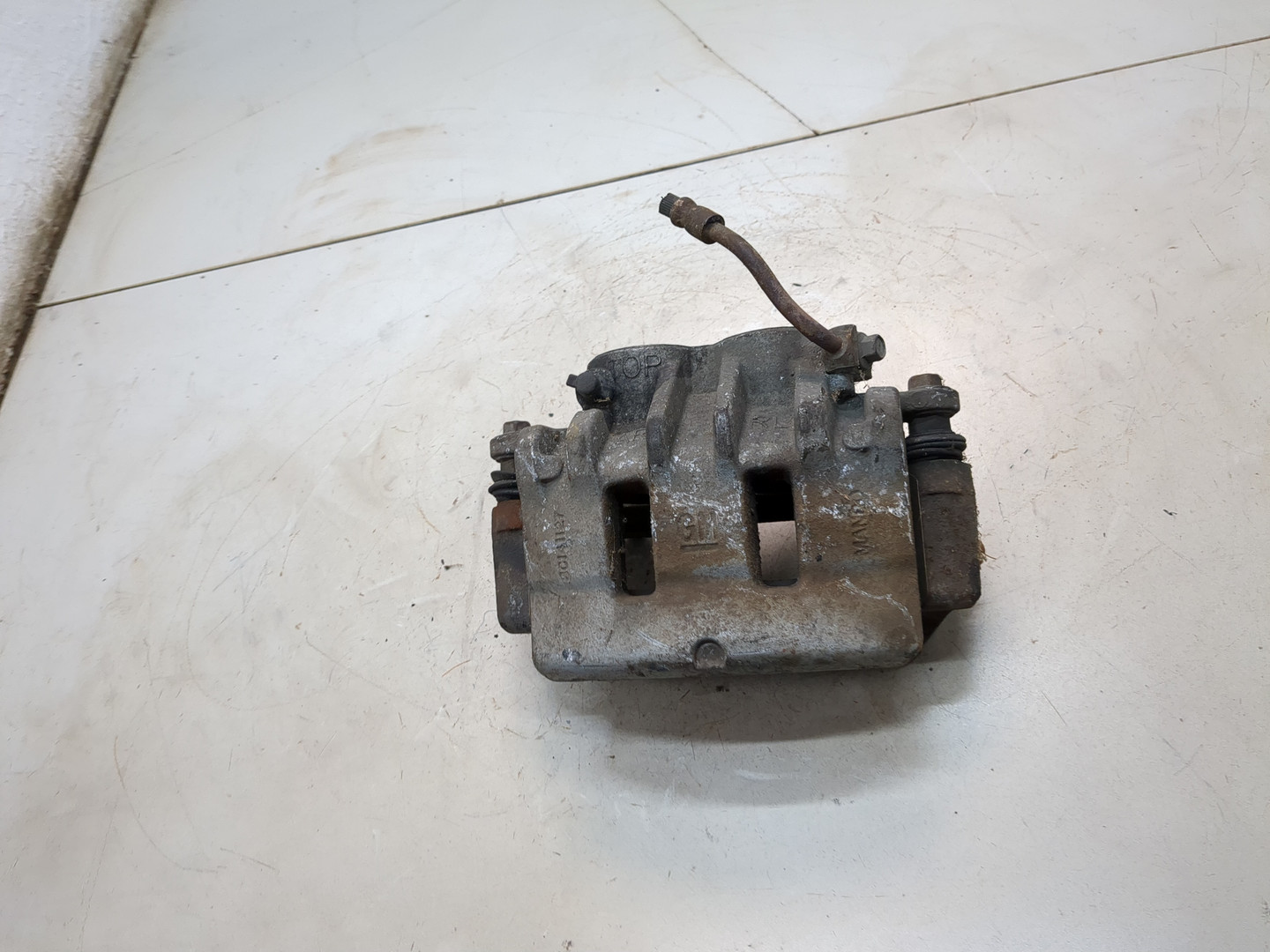 Суппорт передний левый