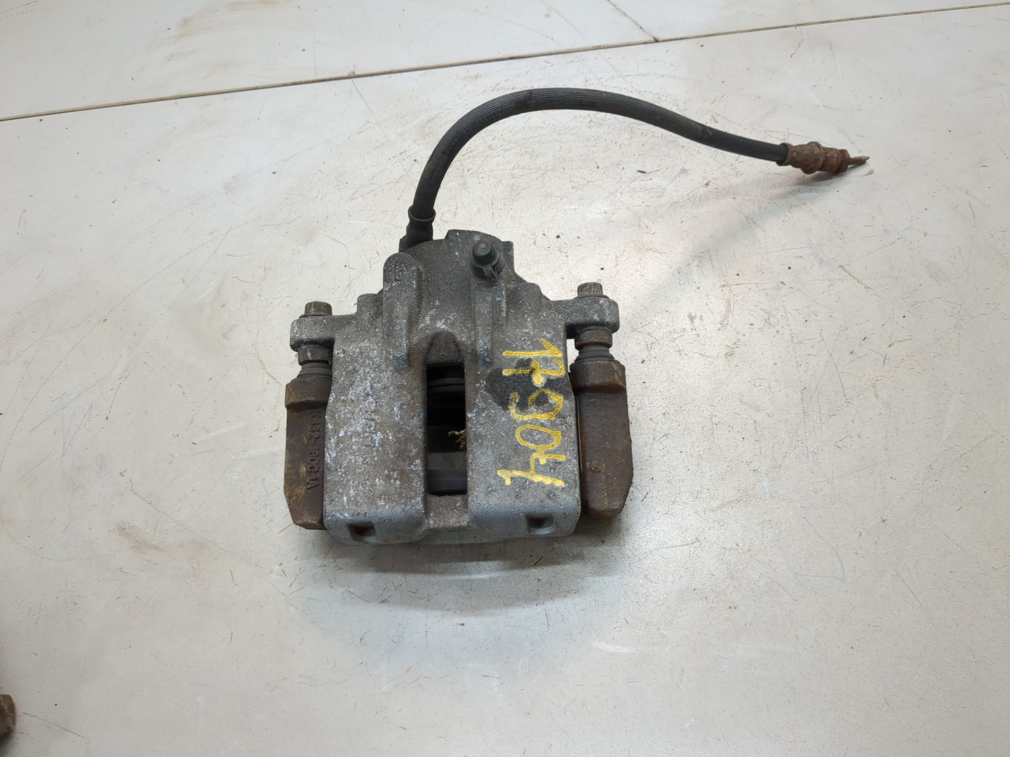 Суппорт задний левый