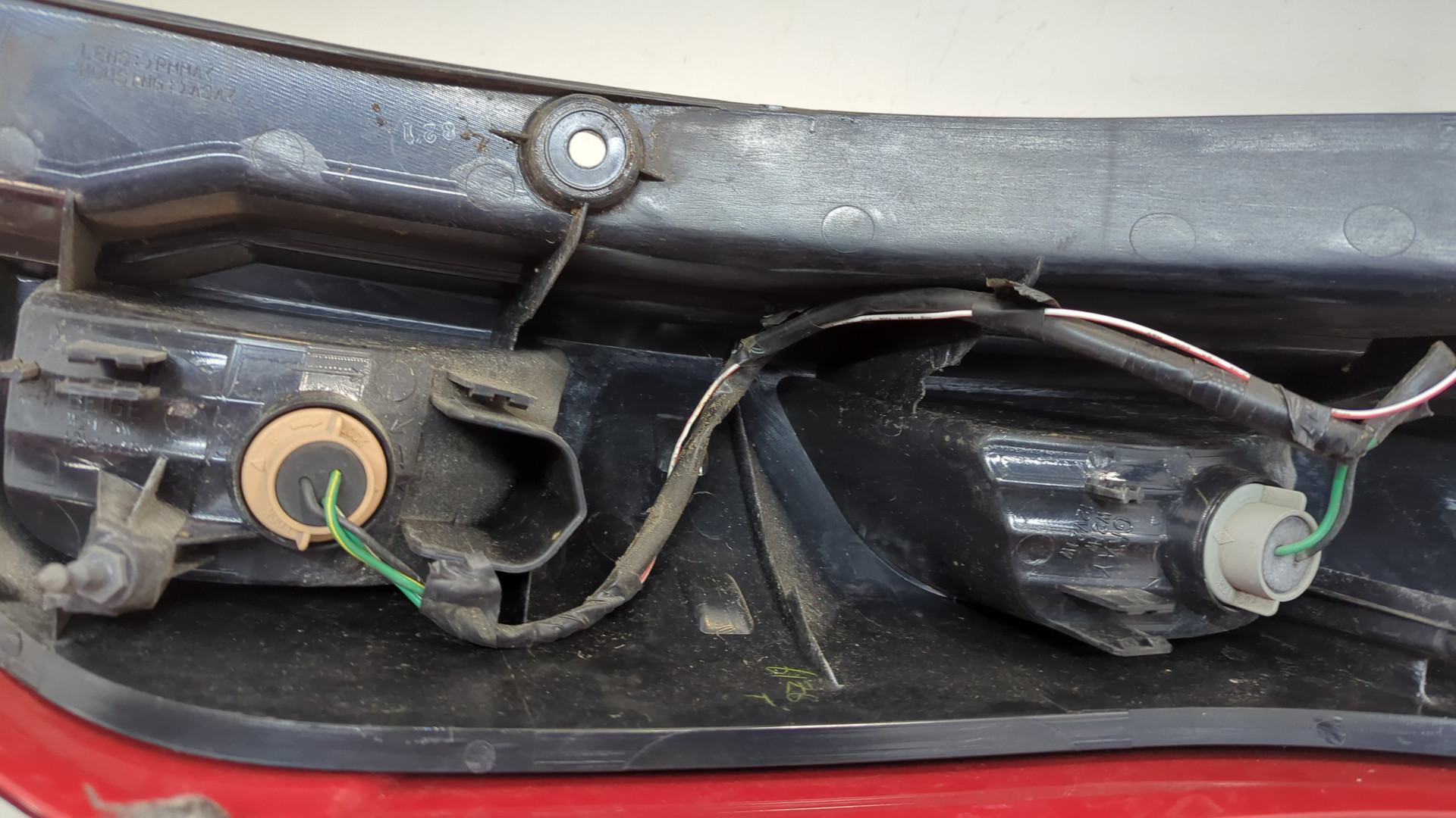 Фонарь задний левый