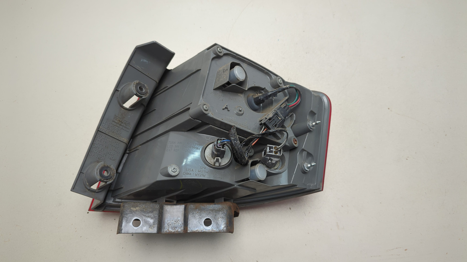 Фонарь задний левый