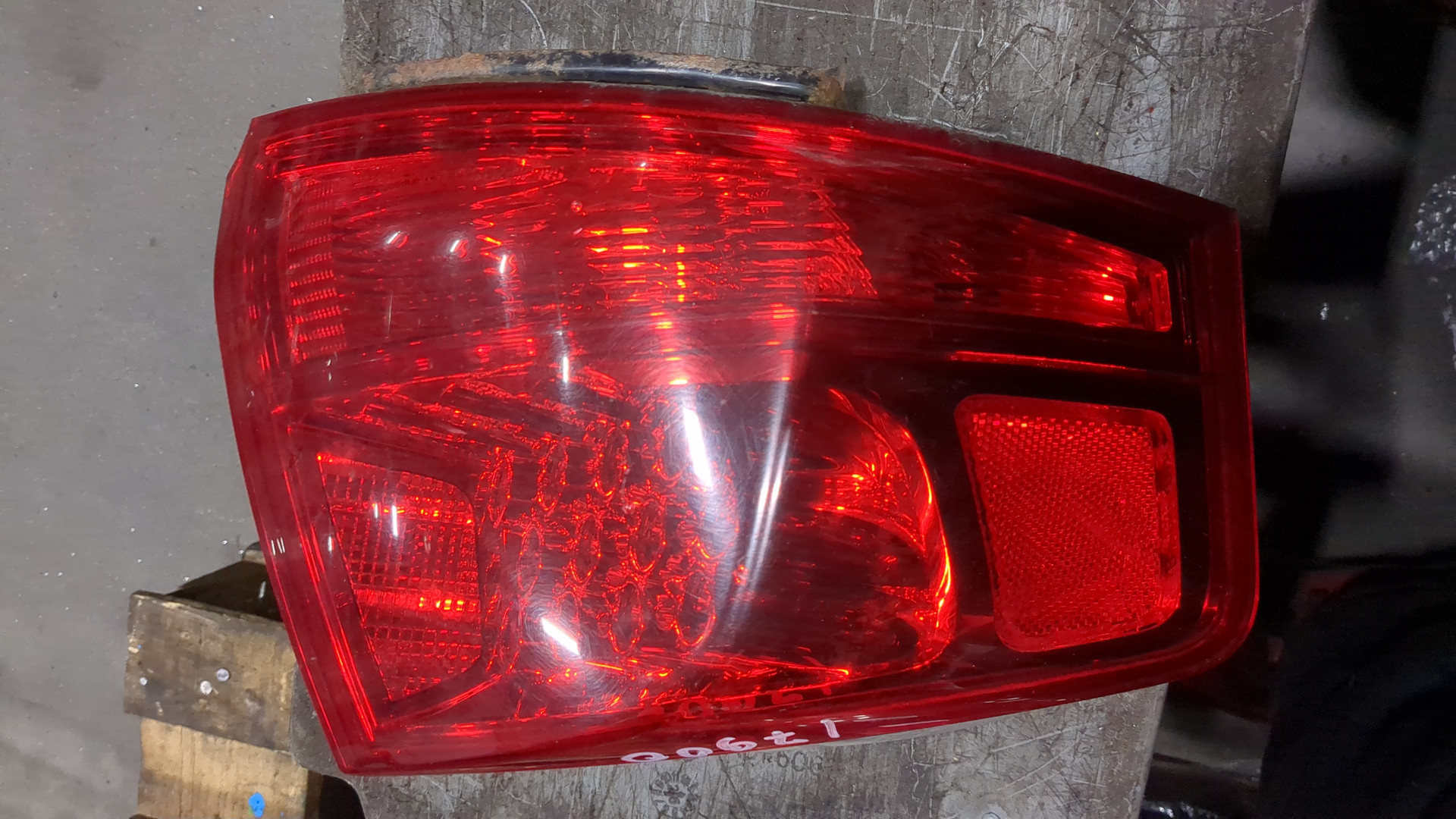 Фонарь задний левый