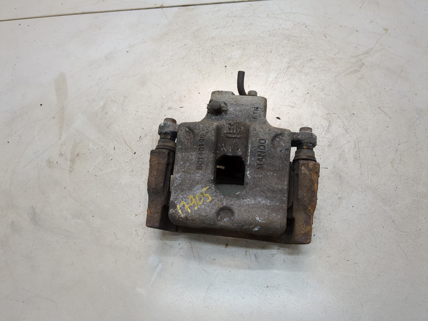 Суппорт задний левый