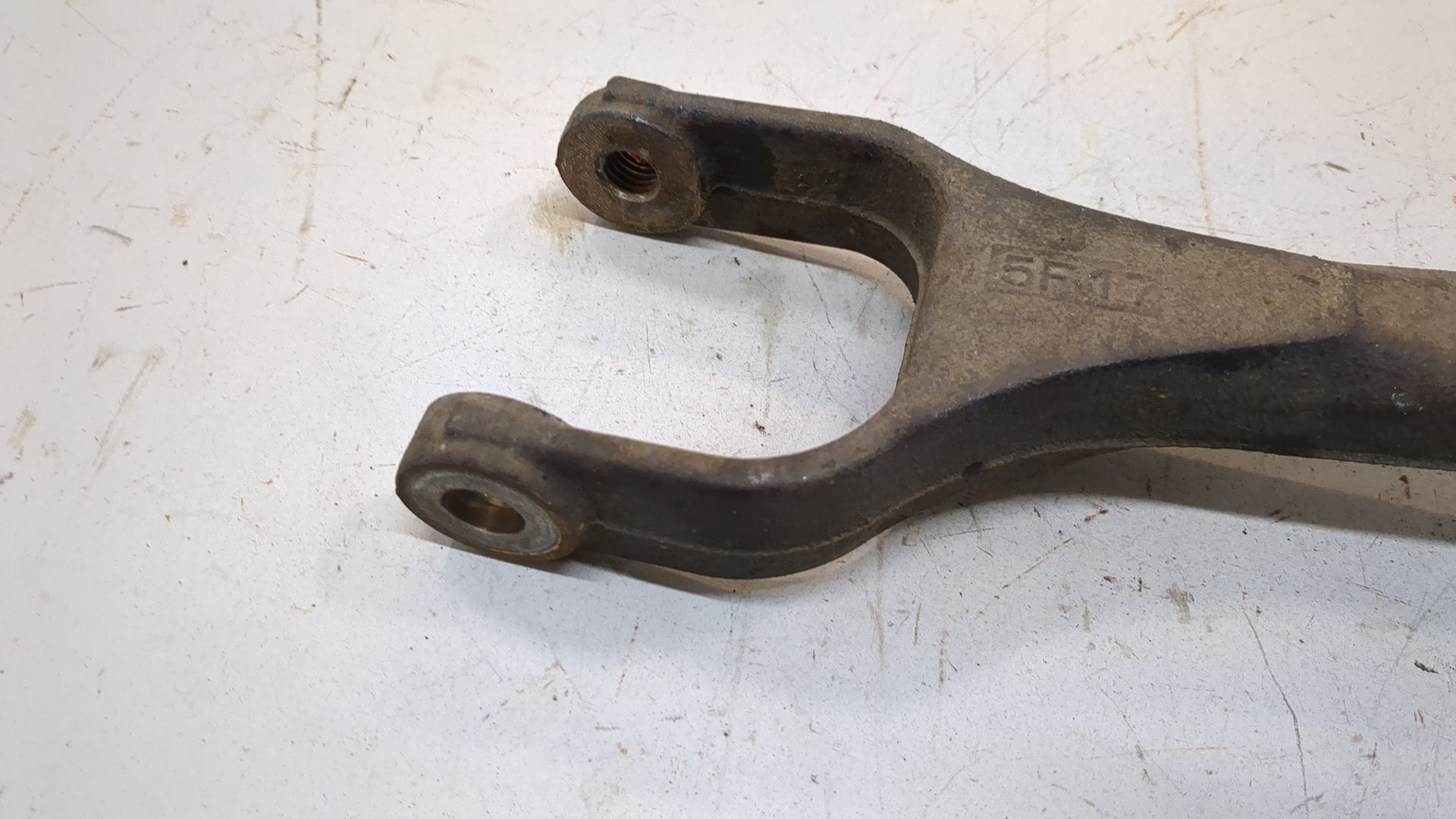 Рычаг задний левый