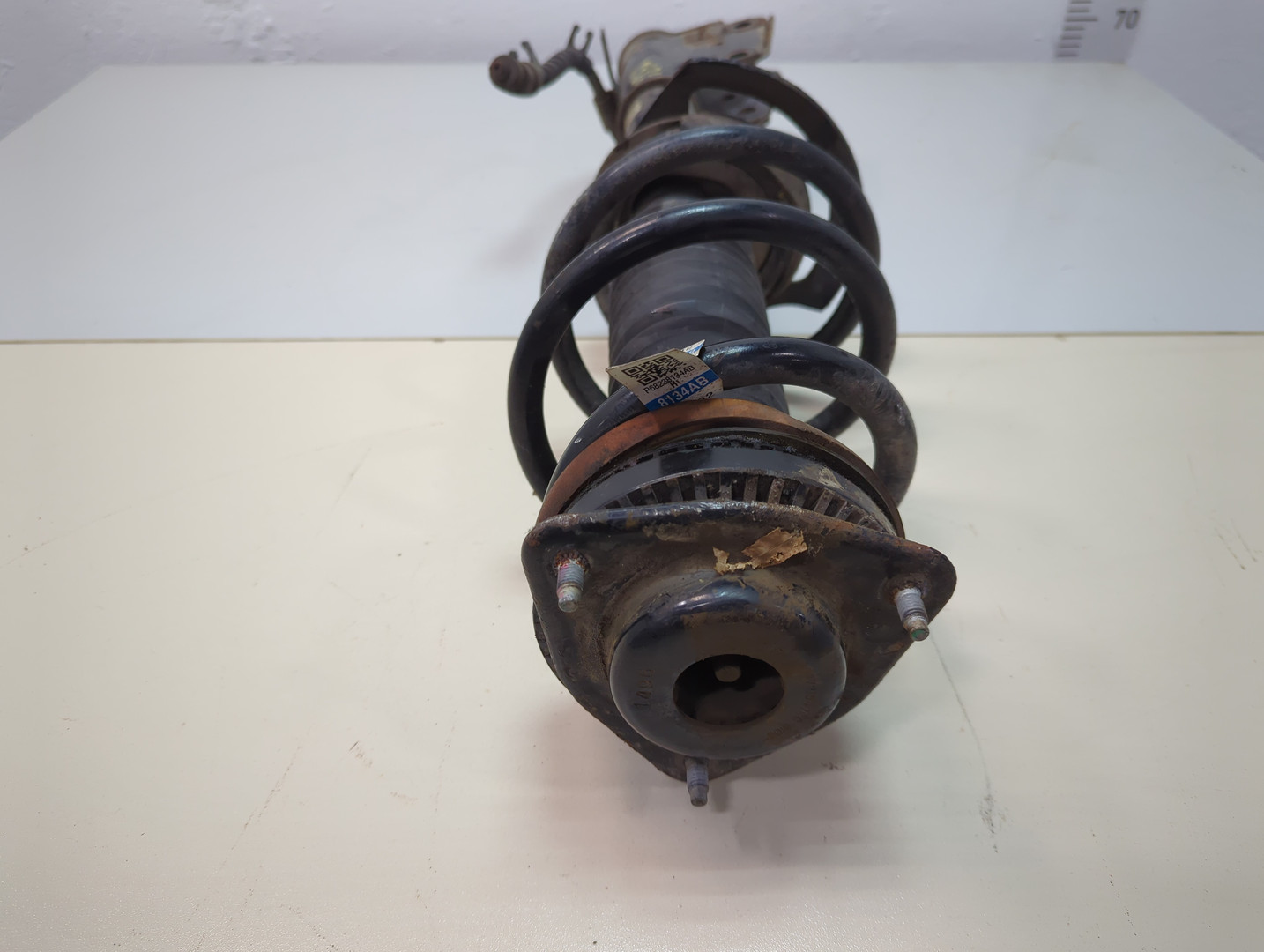 Амортизатор передний левый