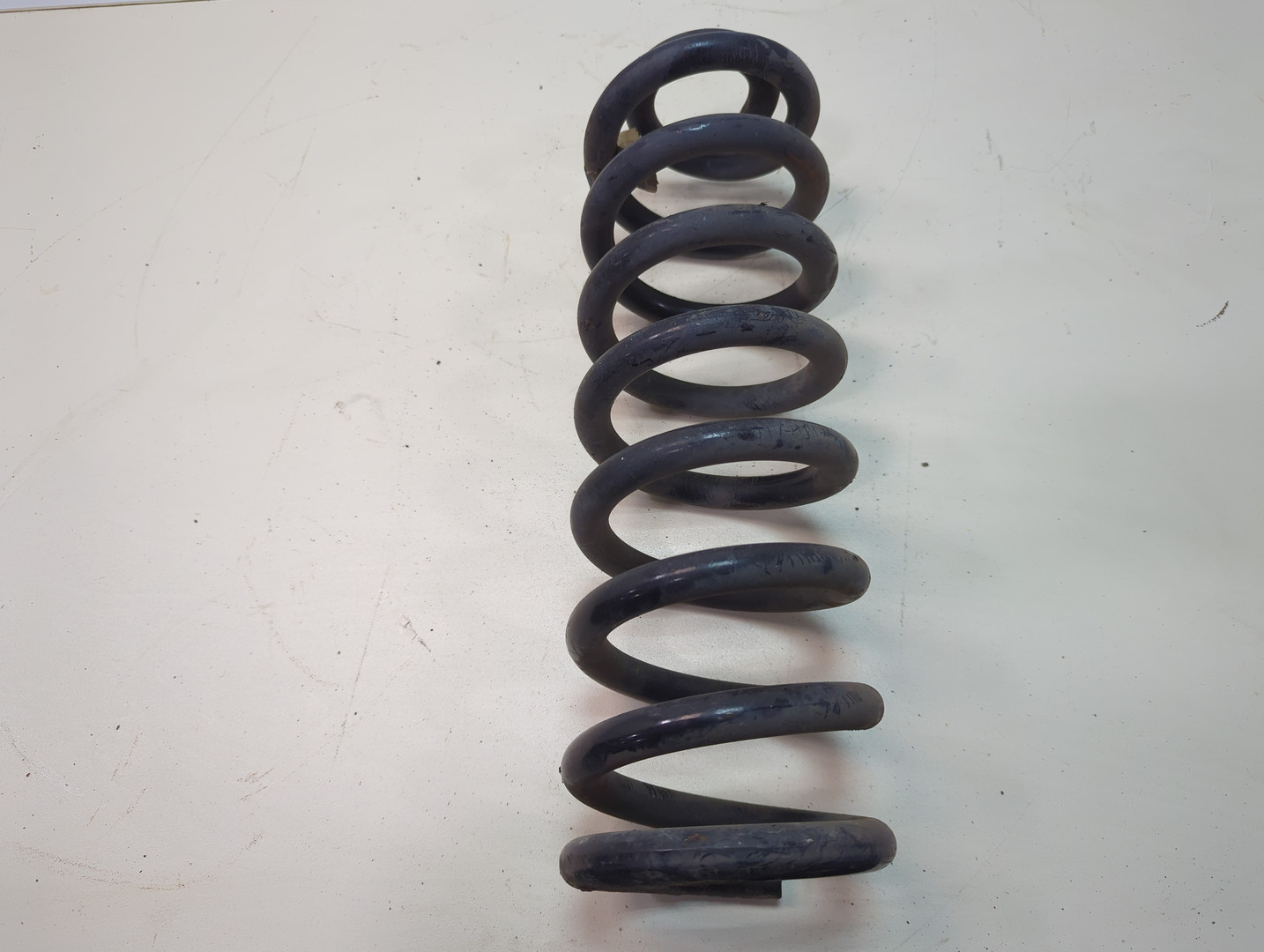 Пружина задняя