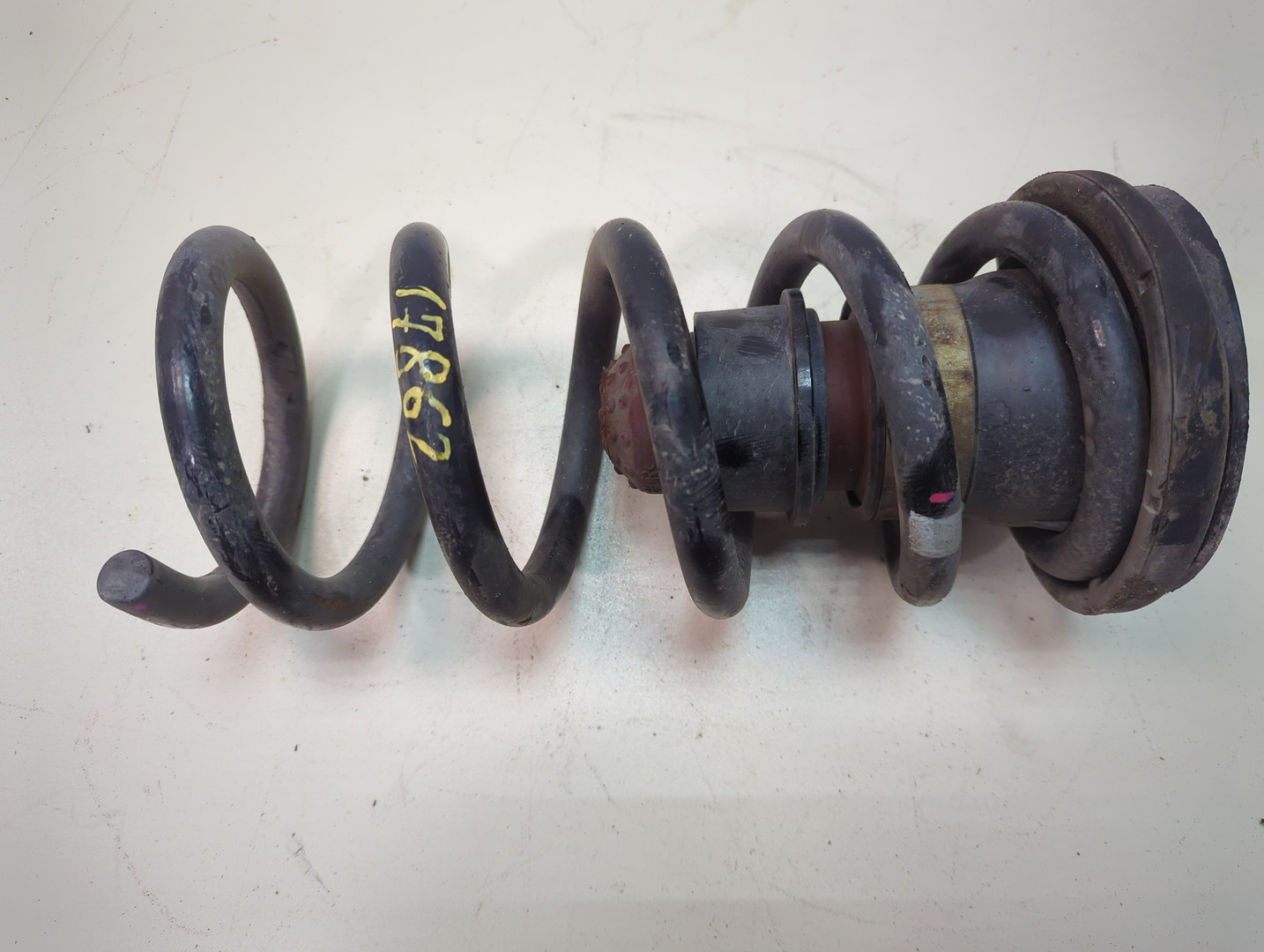 Пружина задняя