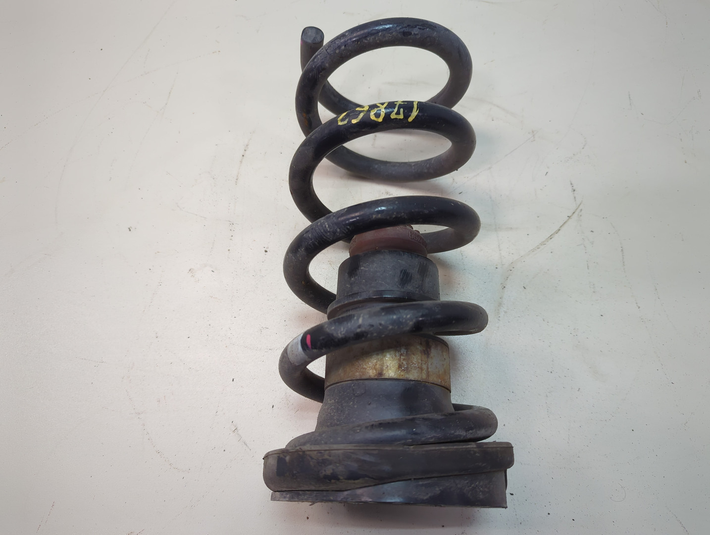 Пружина задняя