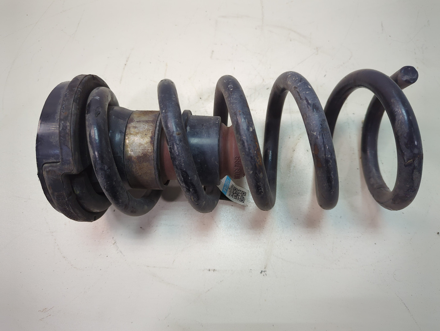 Пружина задняя