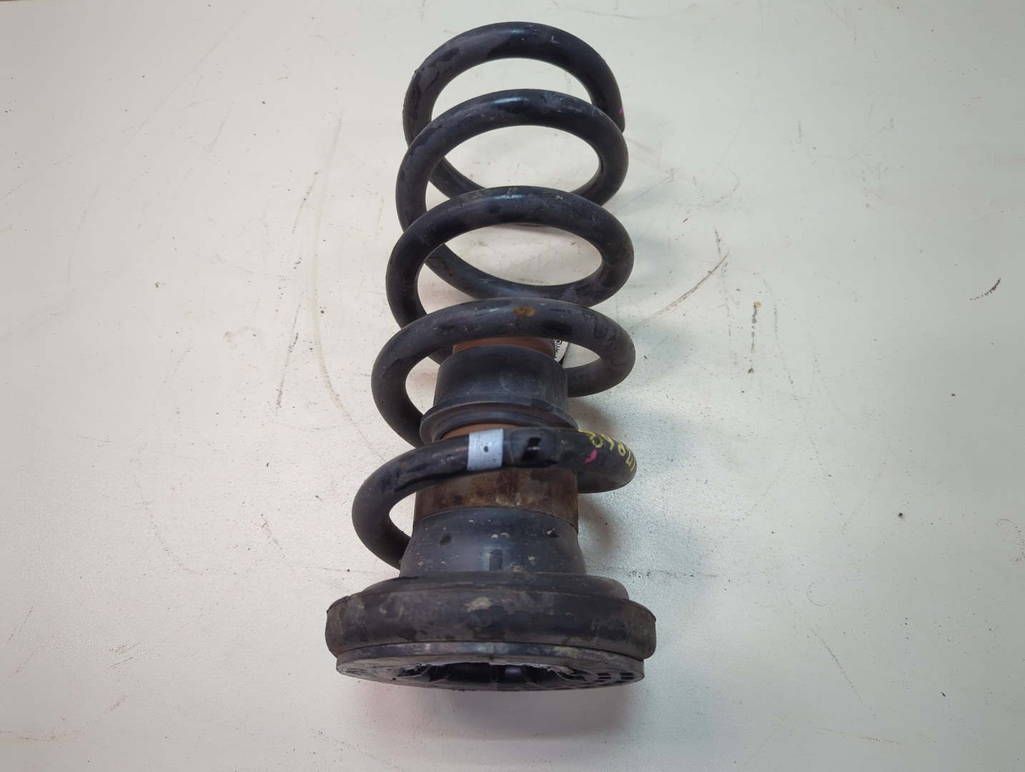 Пружина задняя