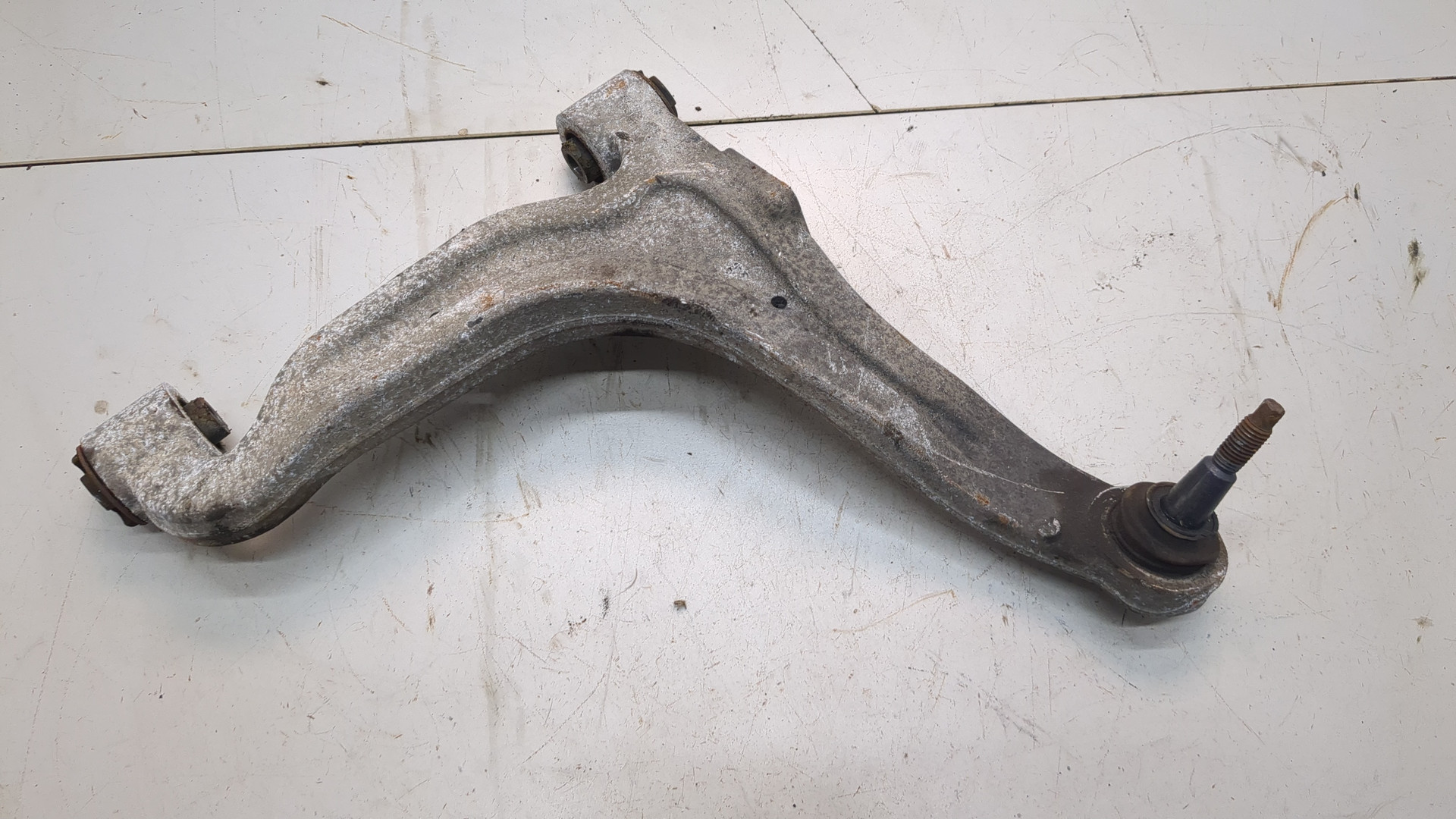 Рычаг задний левый