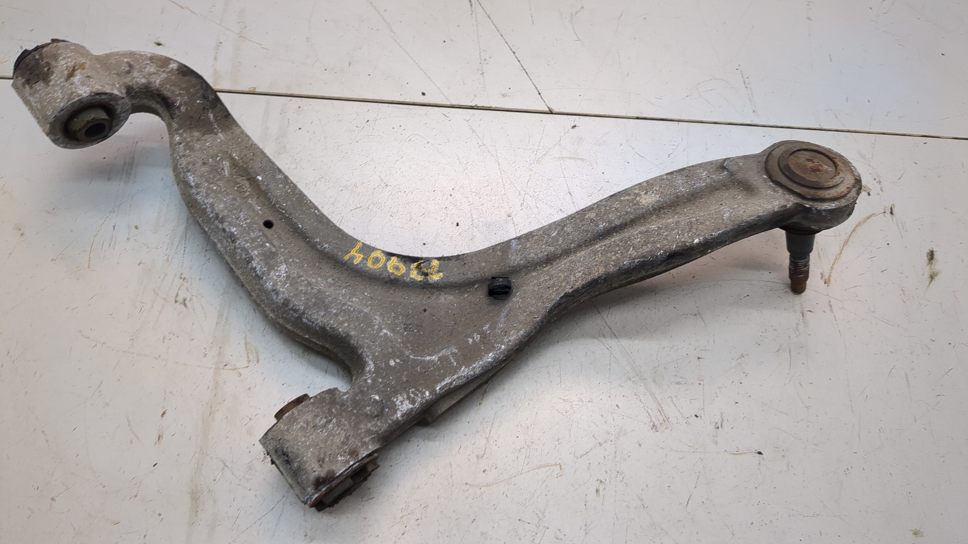 Рычаг задний левый