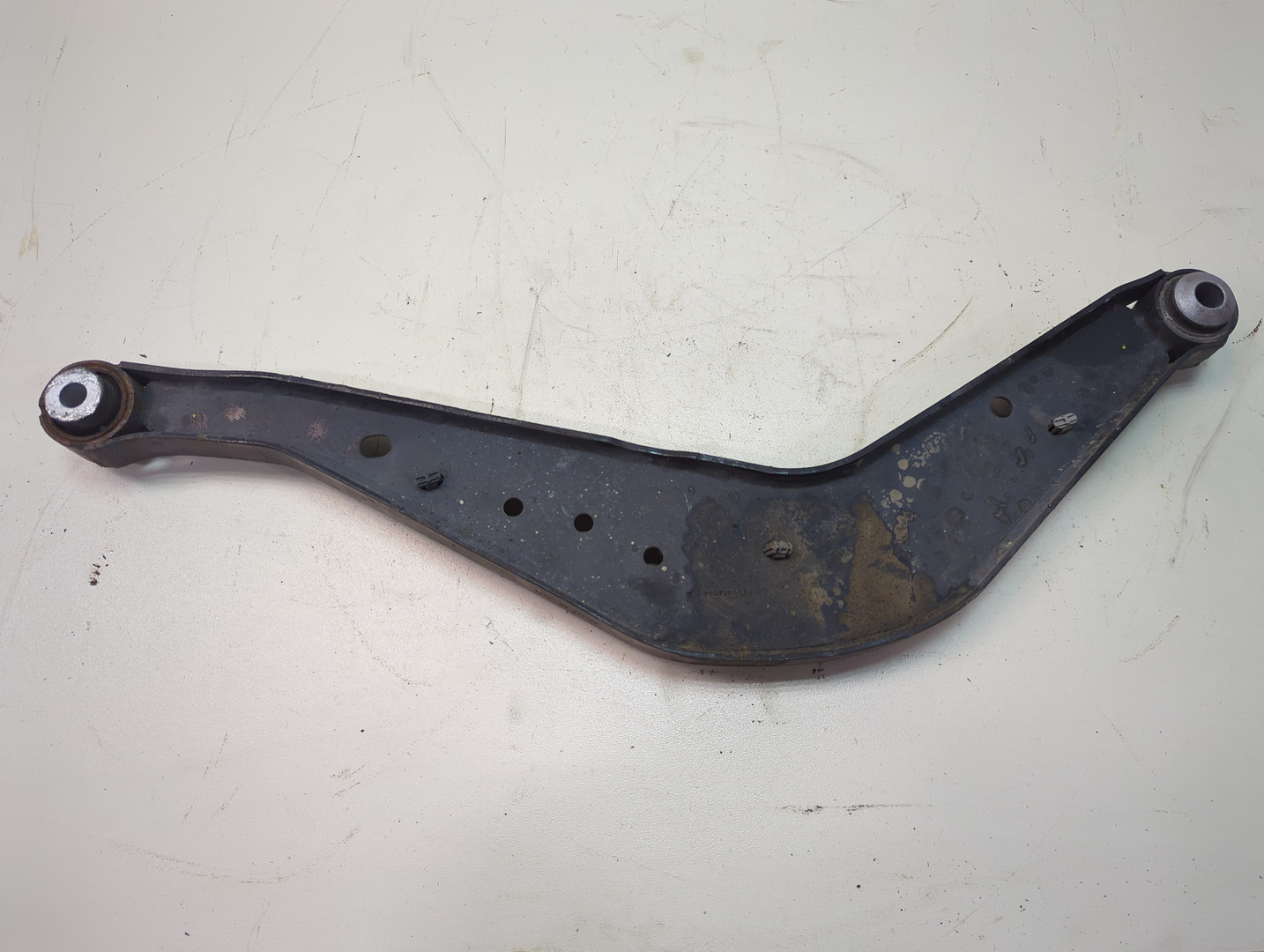 Рычаг задний левый